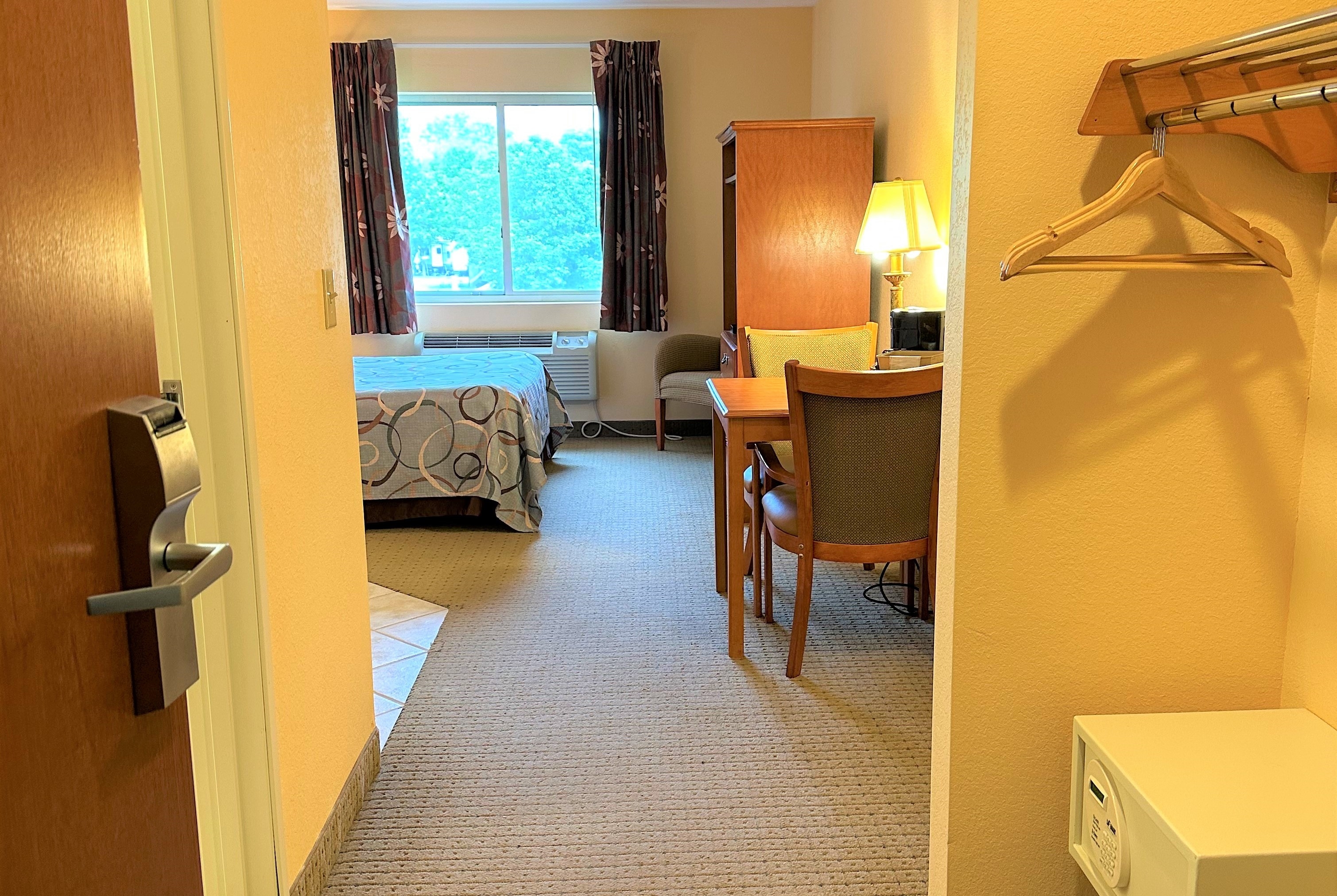 Guest room at the Super 8 by Wyndham Topeka at Forbes Landing in Topeka, Kansas