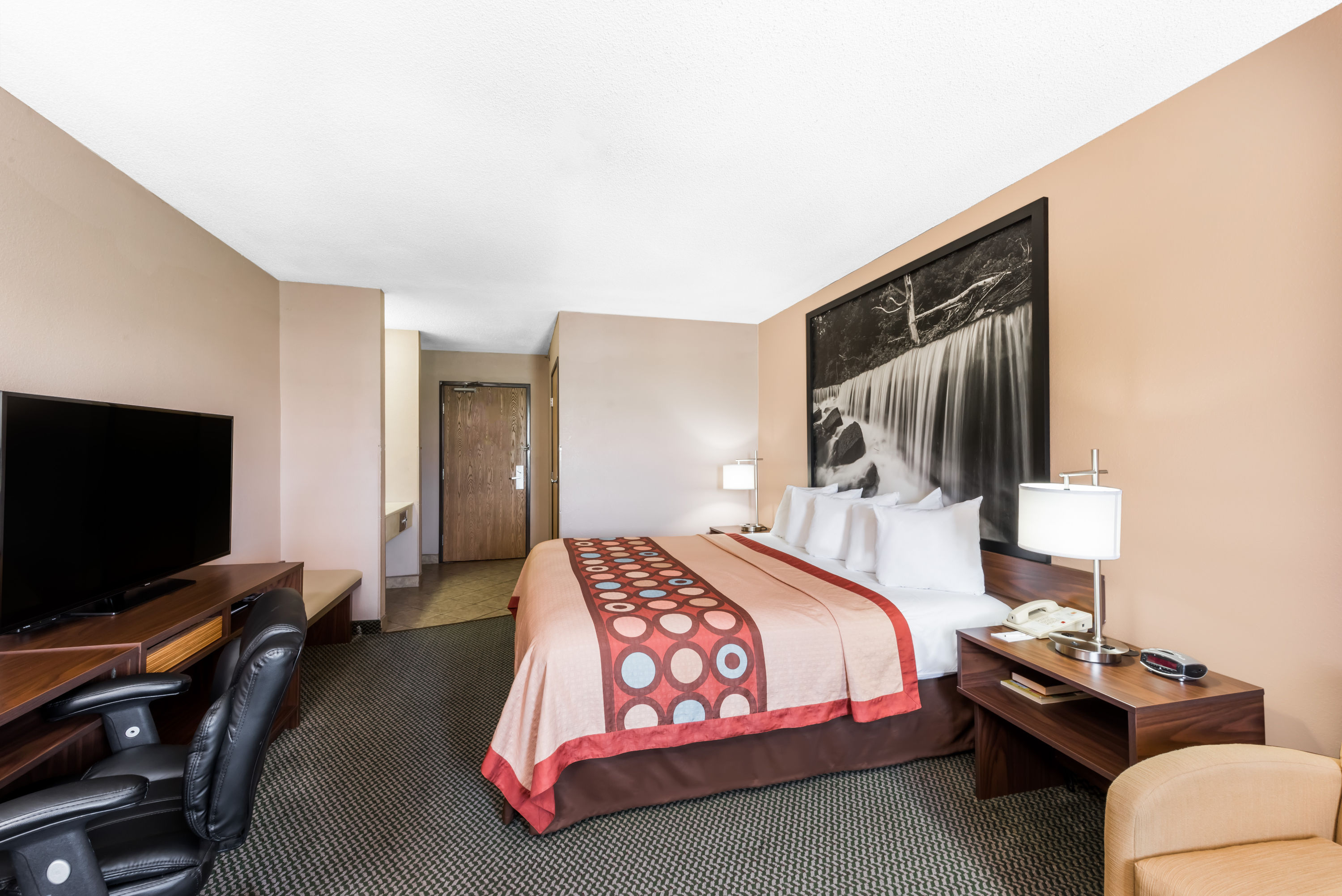 Guest room at the Super 8 by Wyndham Winfield/Quail Ridge Area in Winfield, Kansas