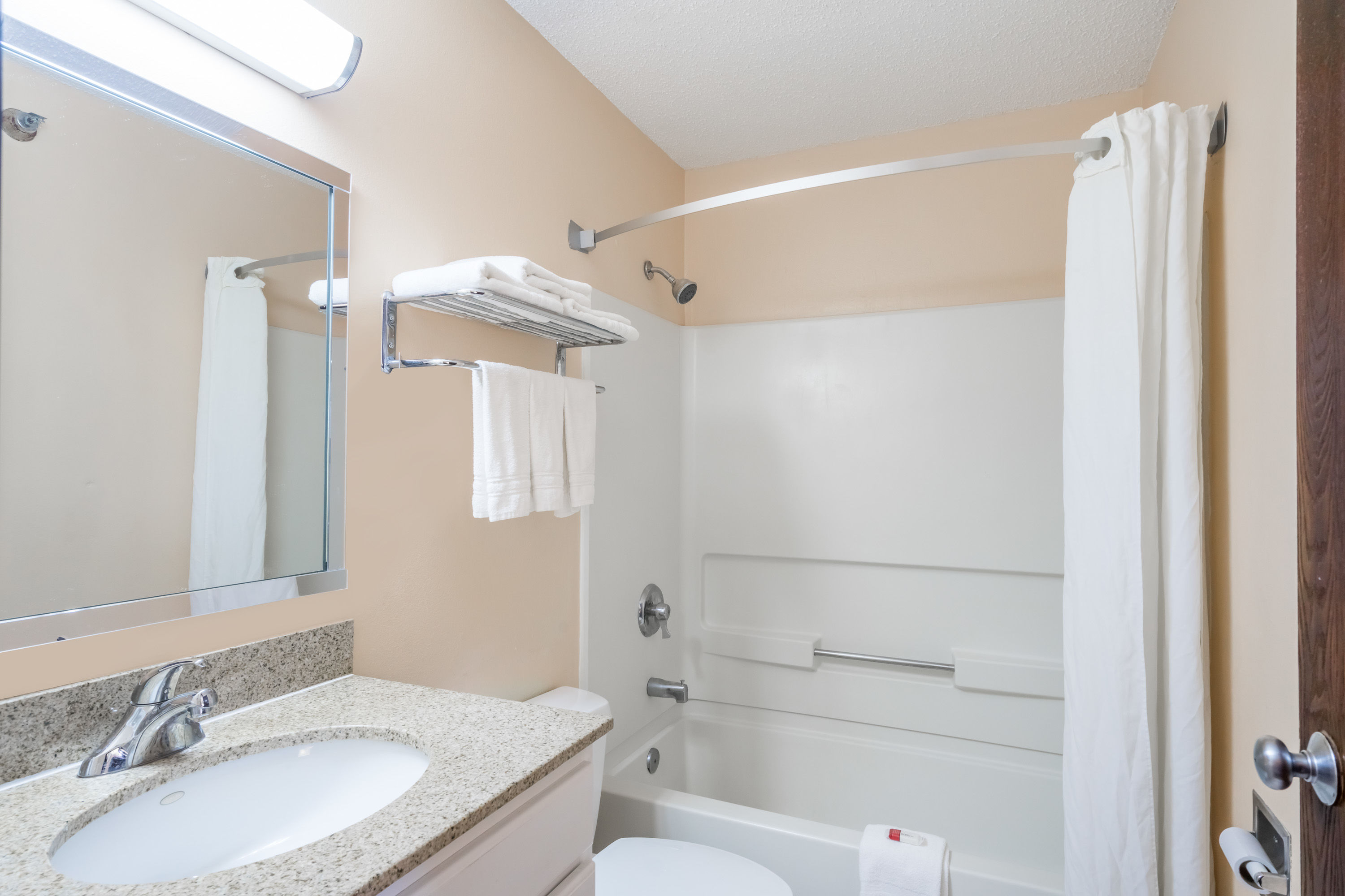 Guest room bath at the Super 8 by Wyndham Campbellsville KY in Campbellsville, Kentucky