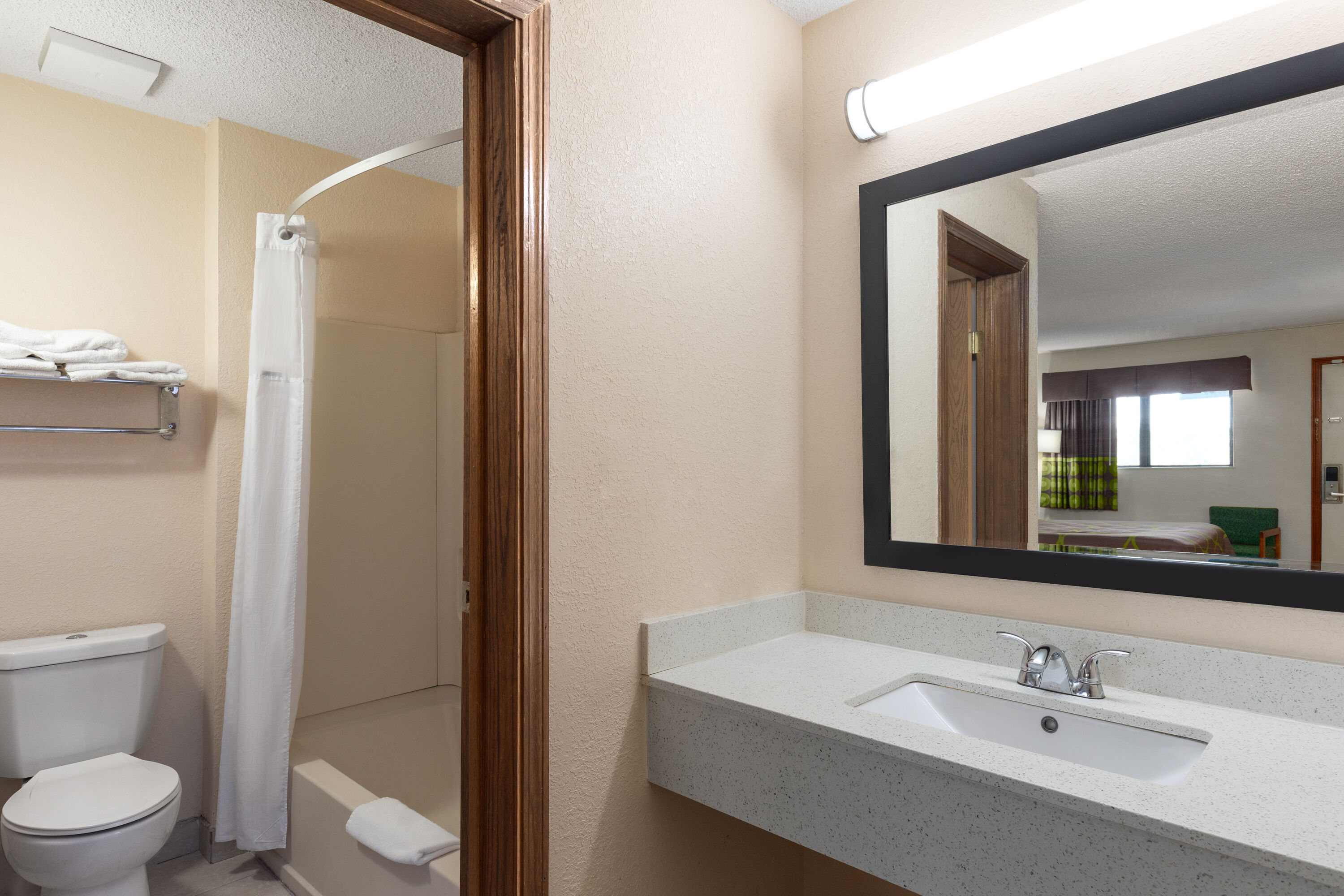 Guest room bath at the Super 8 by Wyndham Fort Mitchell Cincinnati Area in Fort Mitchell, Kentucky