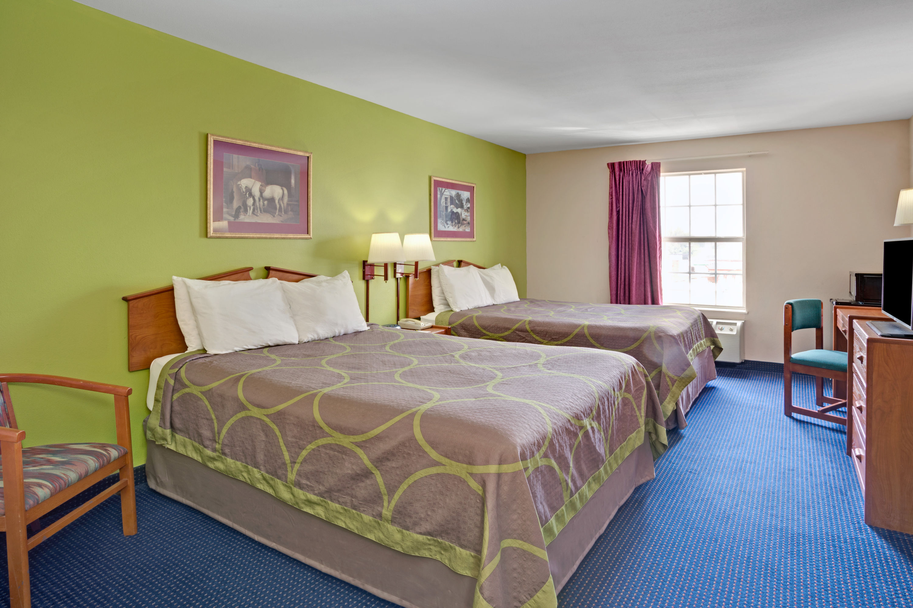 Guest room at the Super 8 by Wyndham Louisville/Expo Center in Louisville, Kentucky