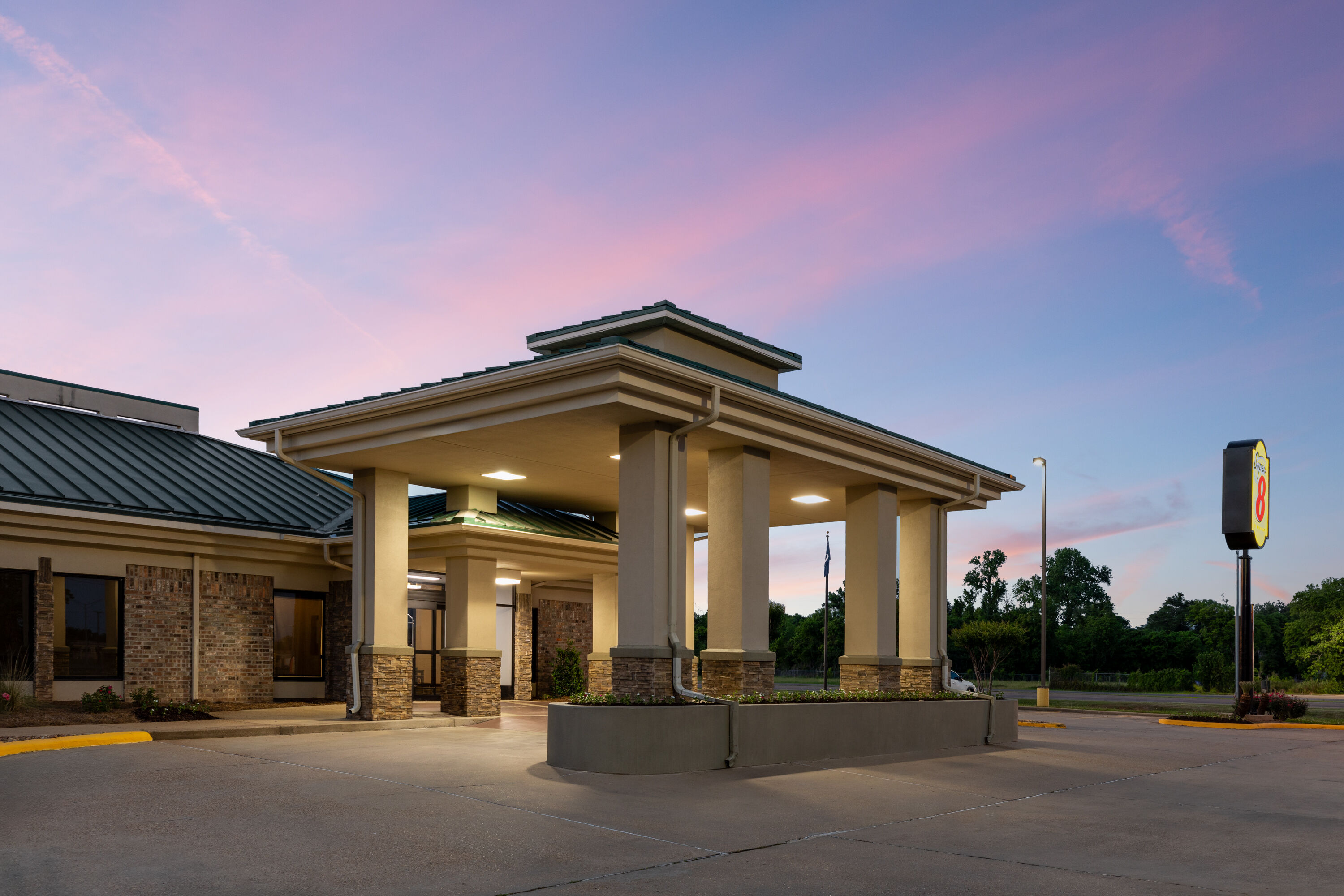 Exterior Dusk Image of Super 8 by Wyndham Alexandria LA hotel in Alexandria, Louisiana
