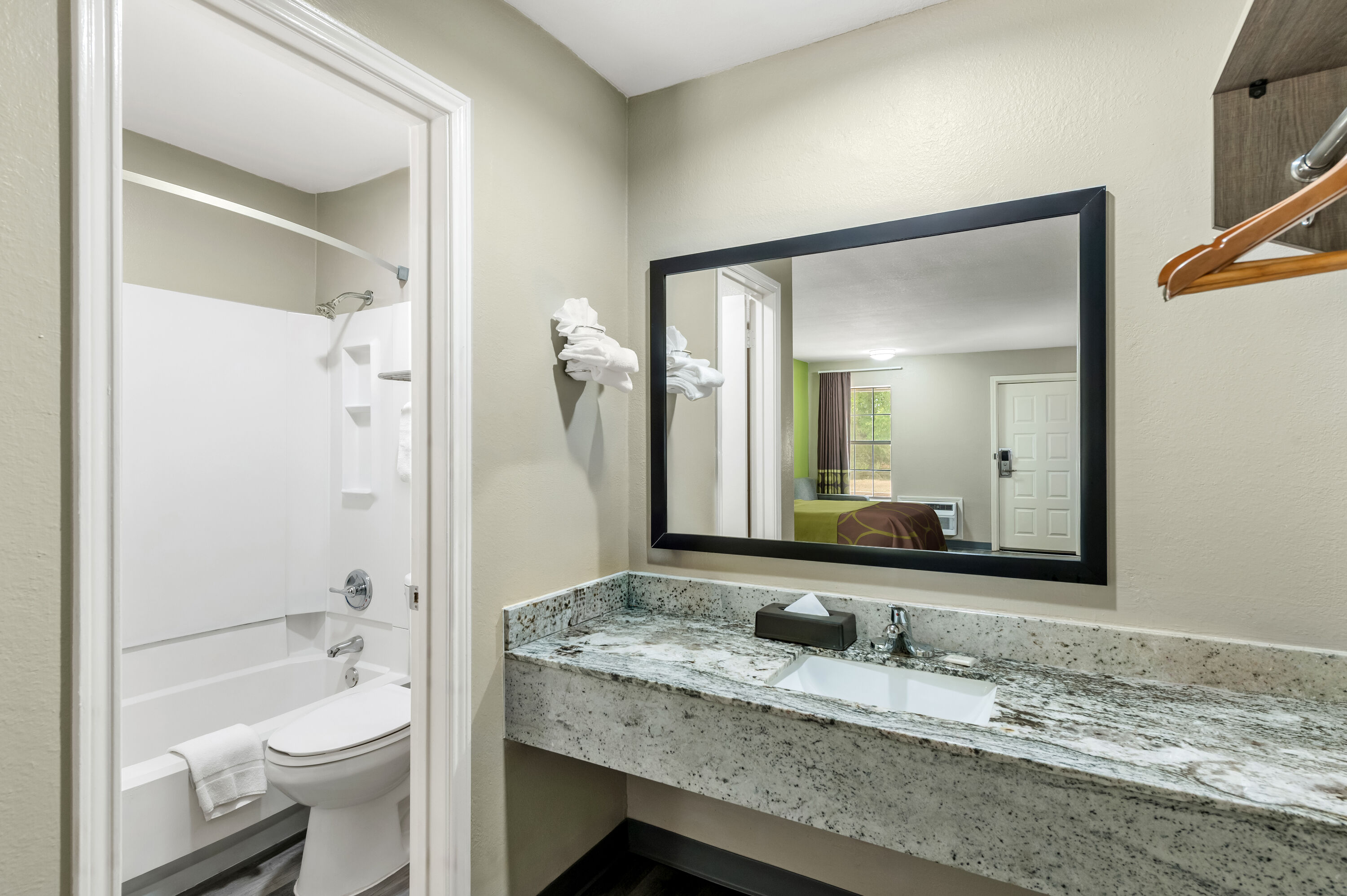 Guest room bath at the Super 8 by Wyndham Bossier City/Shreveport Area in Bossier City, Louisiana