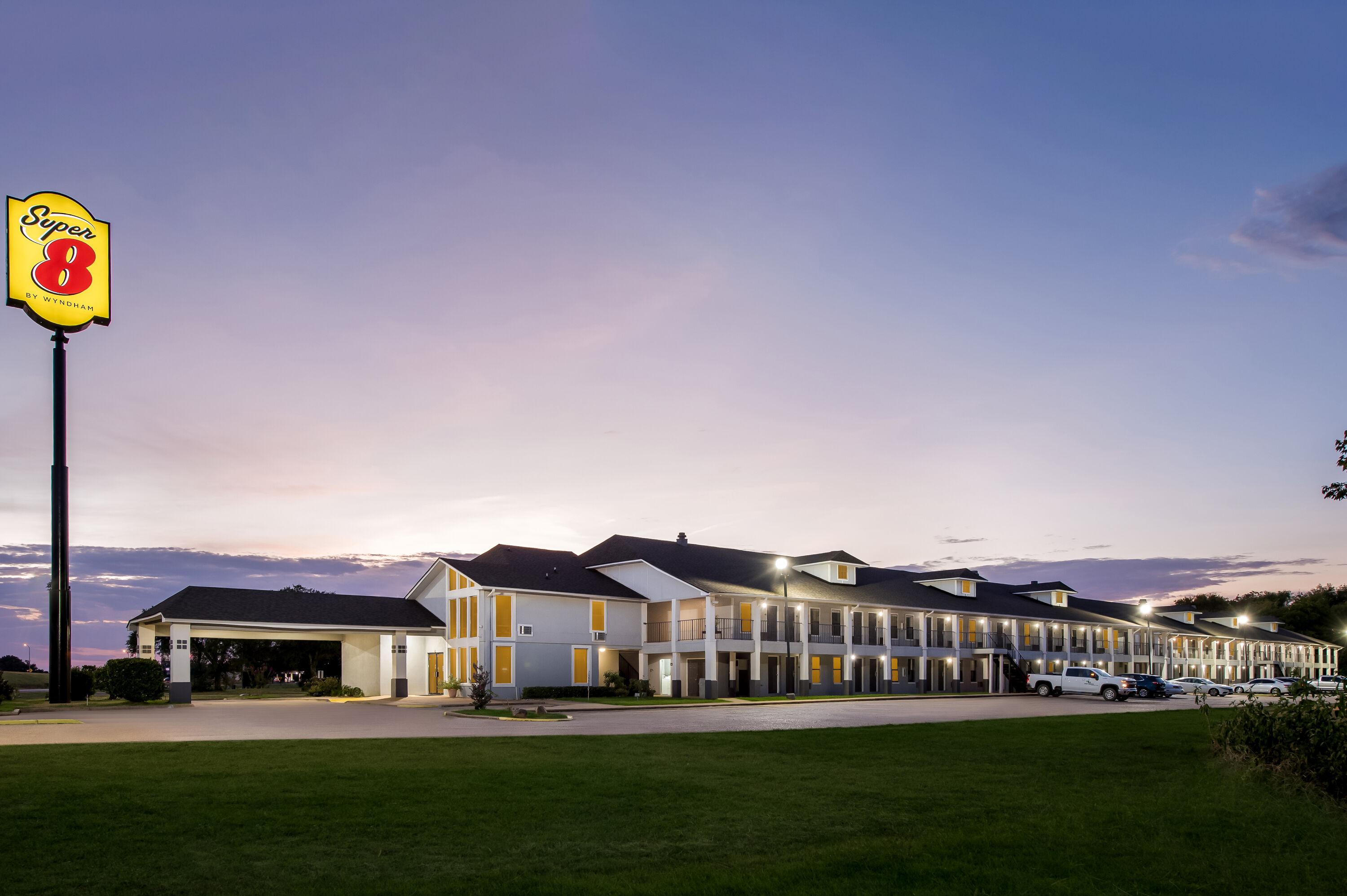 Exterior Night Image of Super 8 by Wyndham Bossier City/Shreveport Area hotel in Bossier City, Louisiana