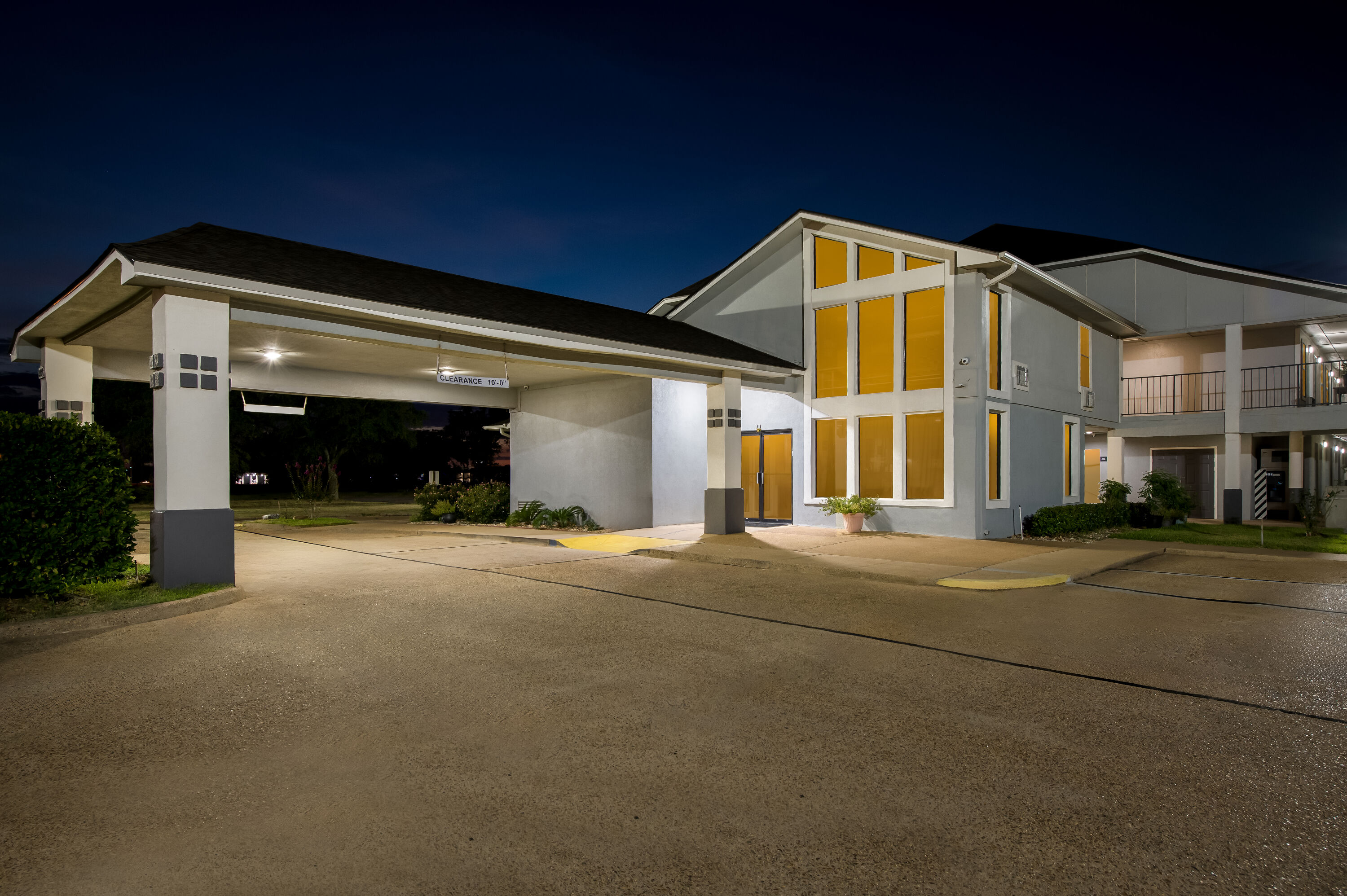 Exterior Night Image of Super 8 by Wyndham Bossier City/Shreveport Area hotel in Bossier City, Louisiana
