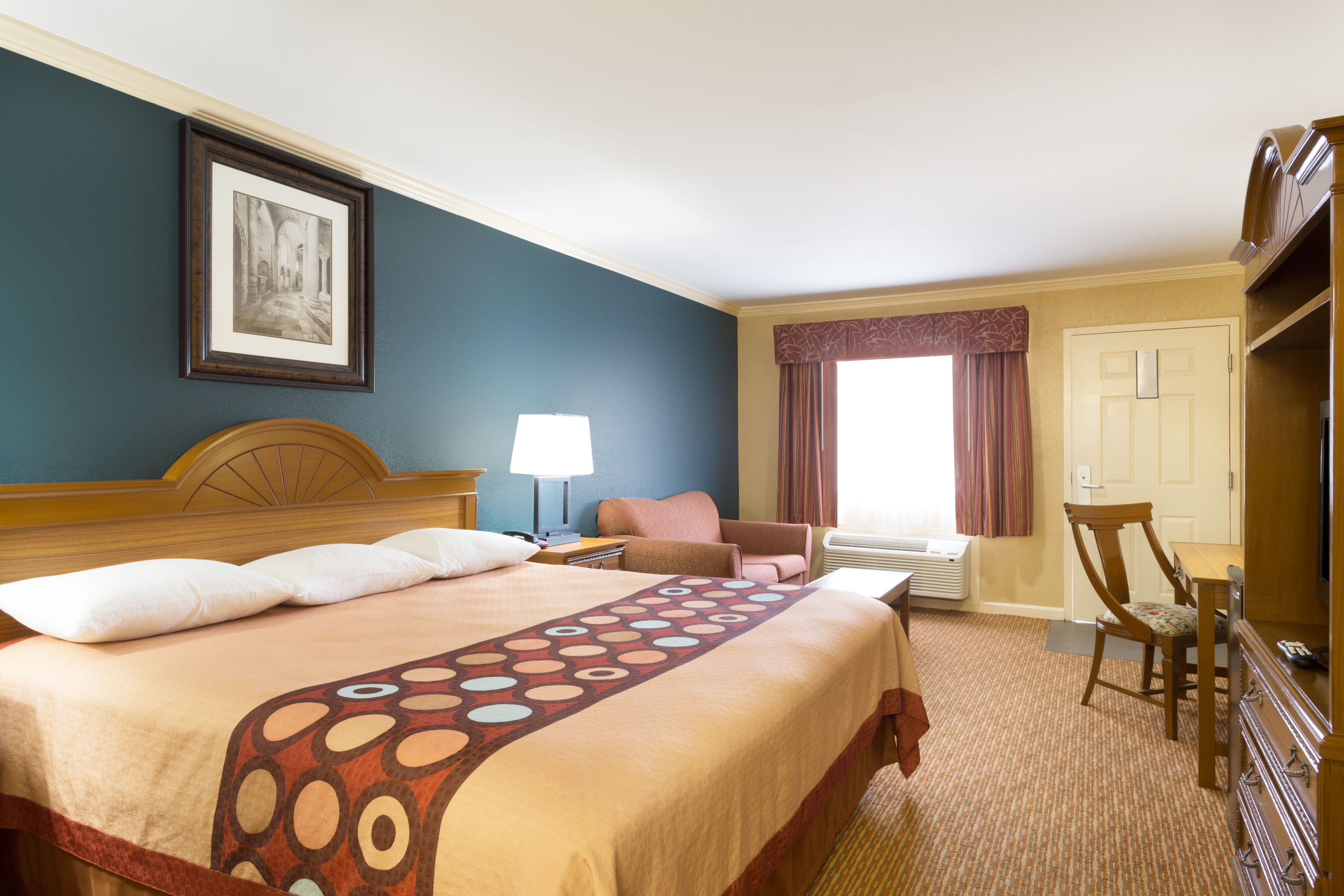 Guest room at the Super 8 by Wyndham Covington in Covington, Louisiana