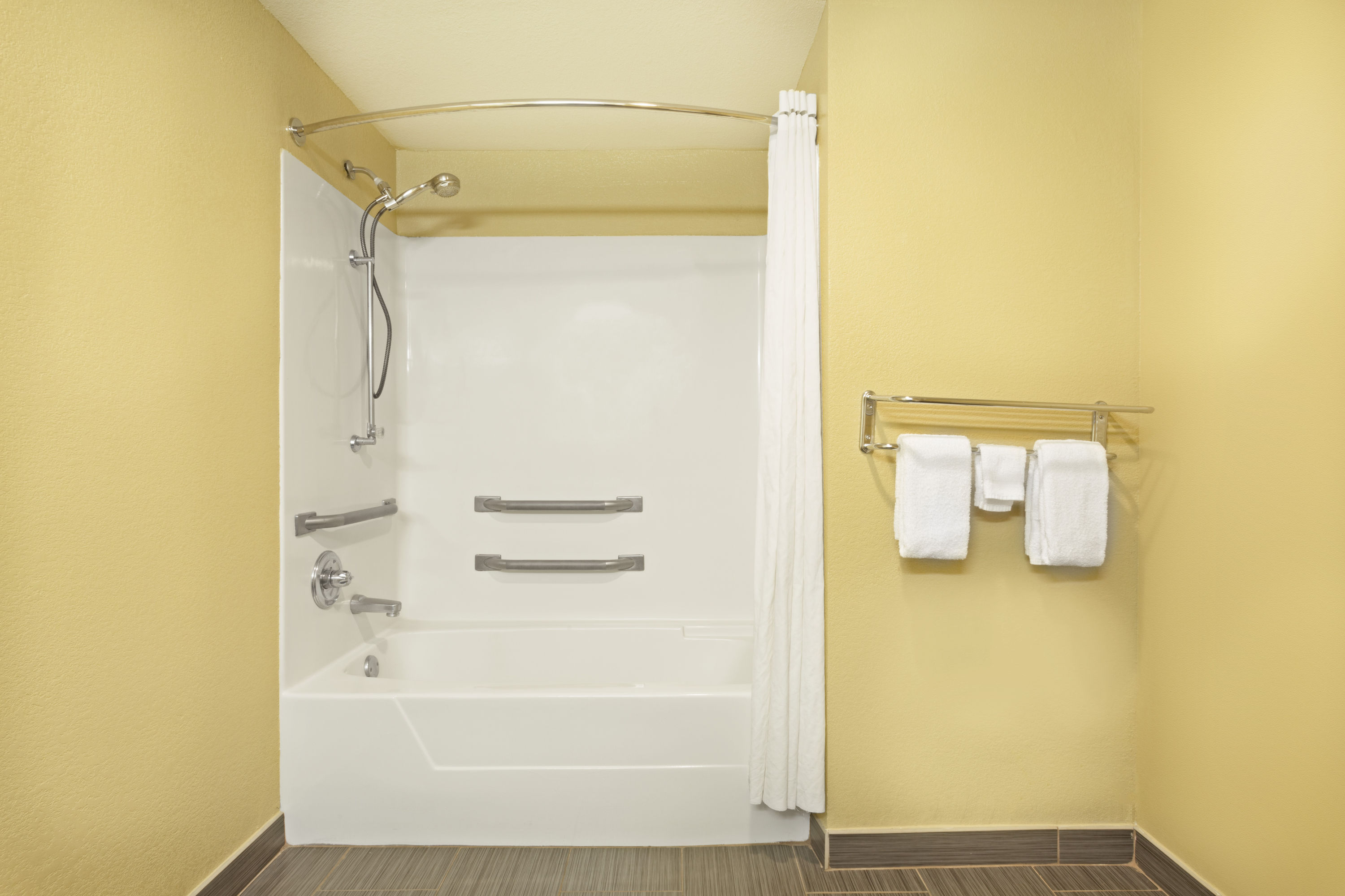 Guest room at the Super 8 by Wyndham Covington in Covington, Louisiana