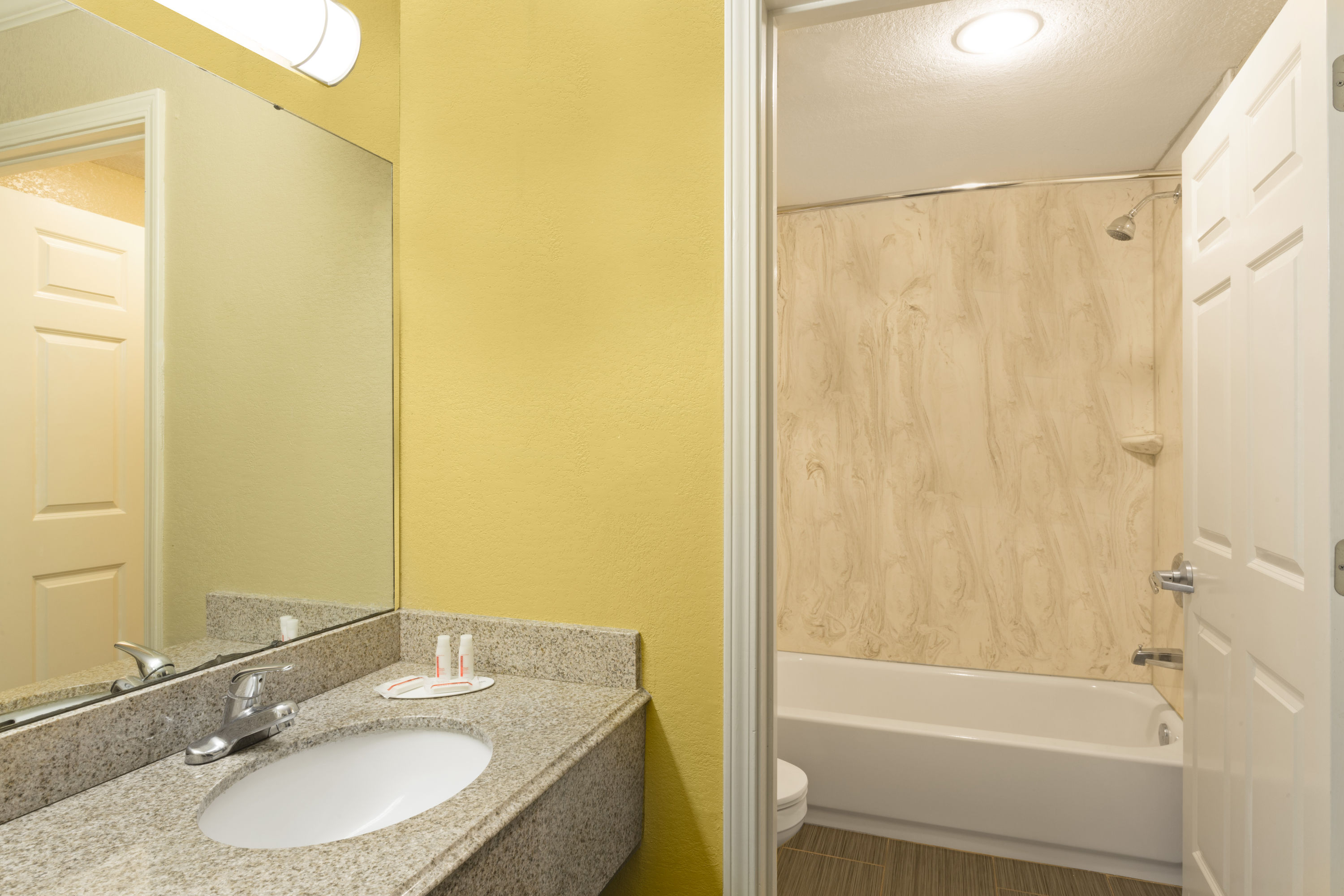 Guest room at the Super 8 by Wyndham Covington in Covington, Louisiana