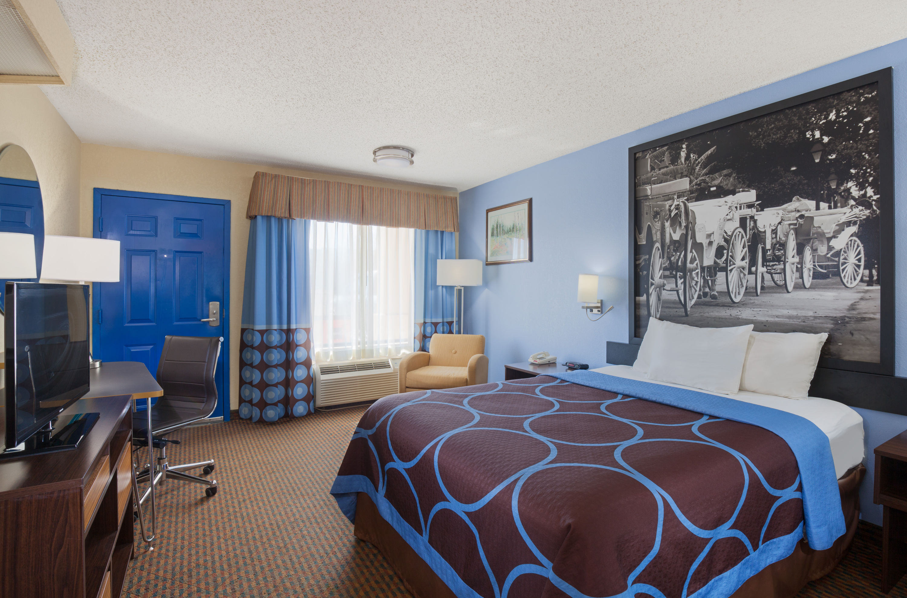 Guest room at the Super 8 by Wyndham Hammond in Hammond, Louisiana