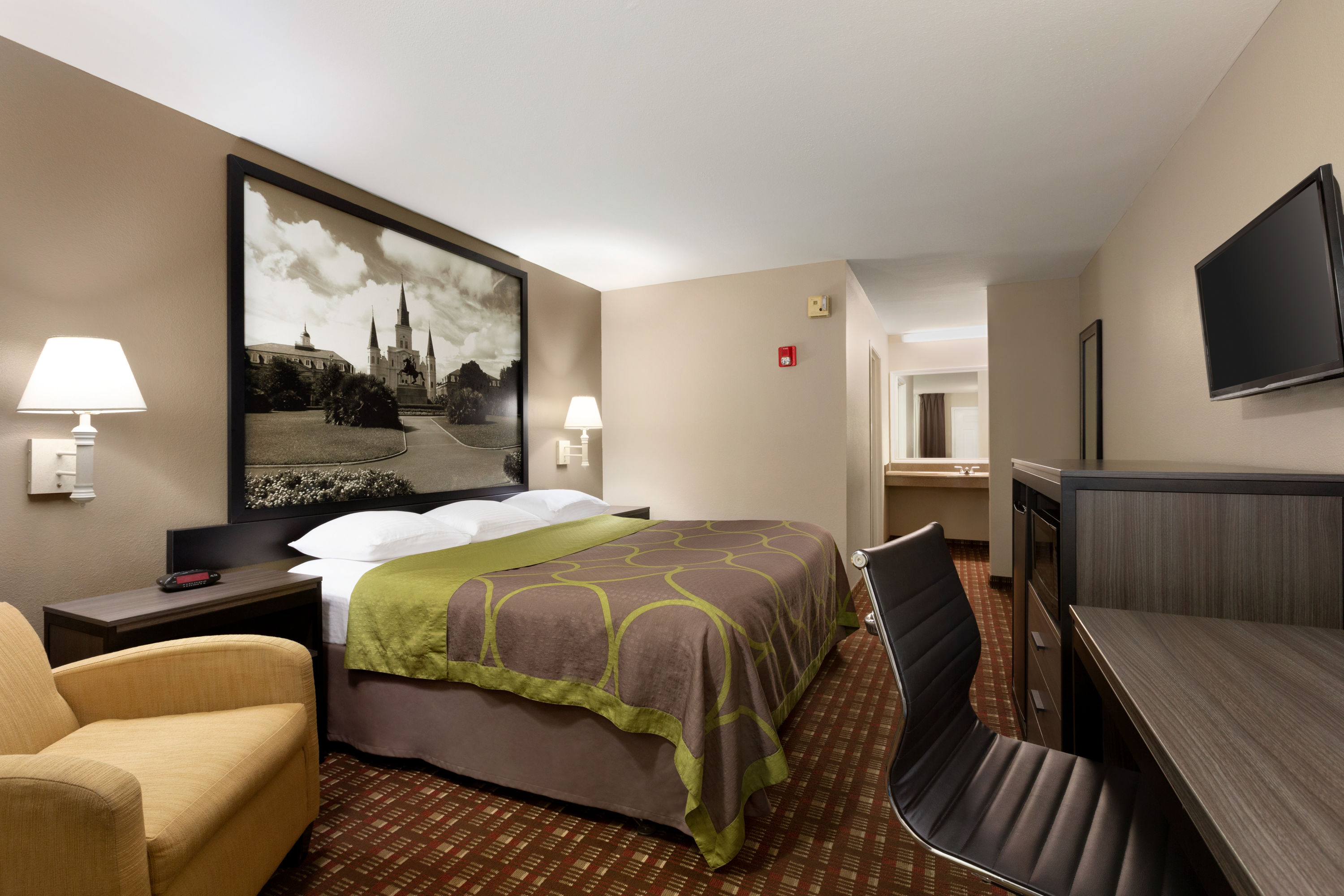 Guest room at the Super 8 by Wyndham Lake Charles Northeast in Lake Charles, Louisiana