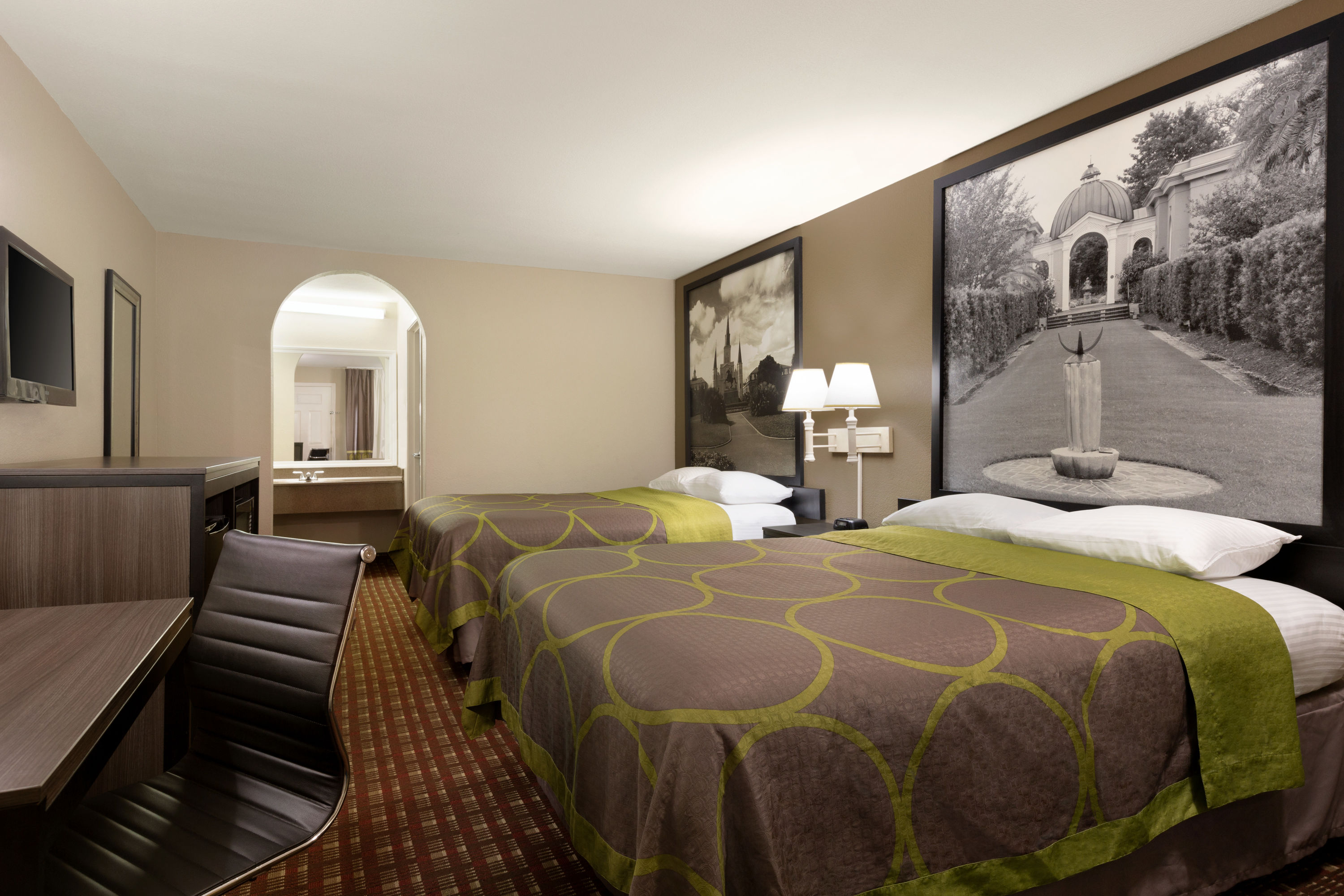 Guest room at the Super 8 by Wyndham Lake Charles Northeast in Lake Charles, Louisiana