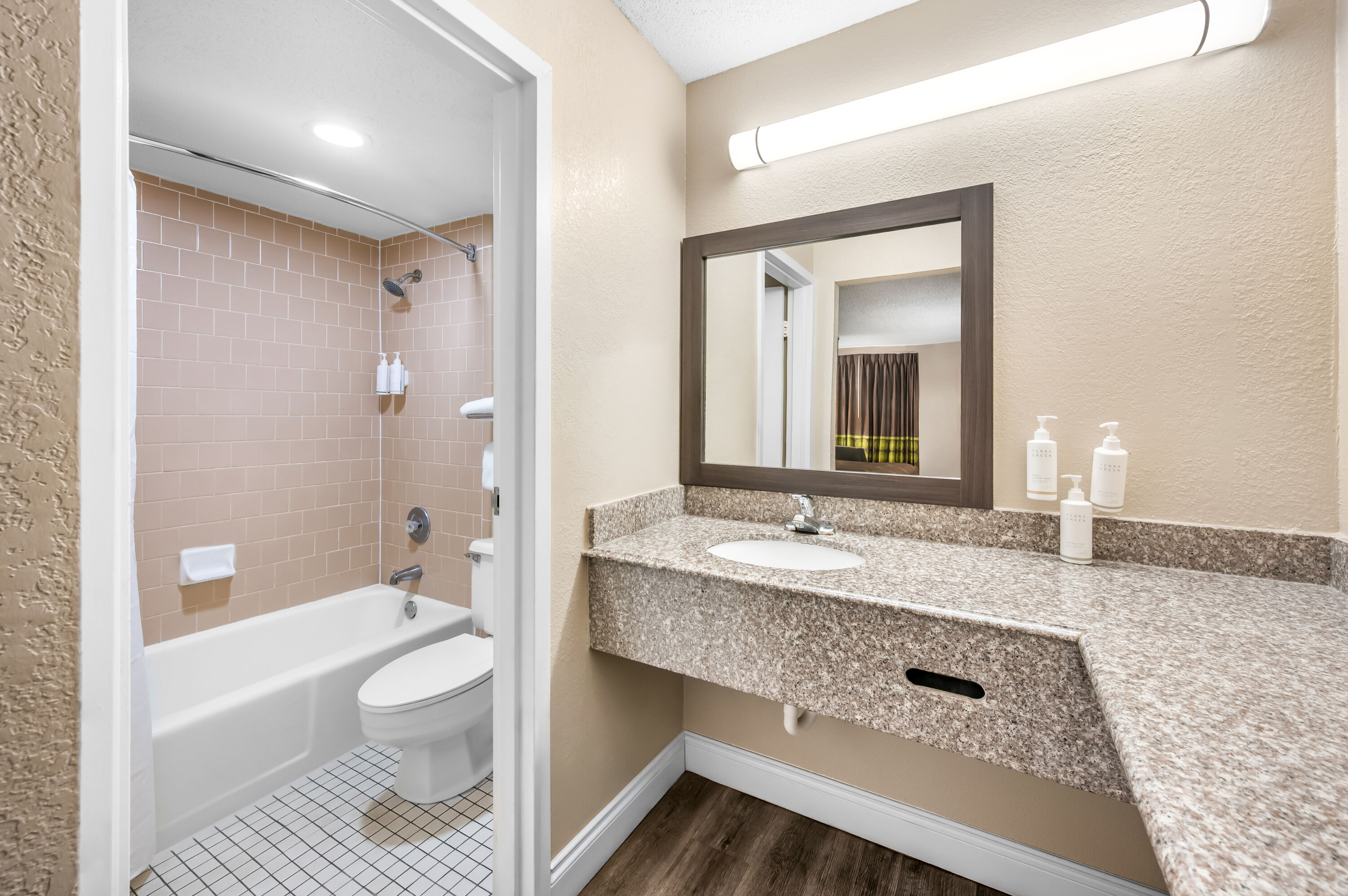 Guest room bath at the Super 8 by Wyndham Metairie in Metairie, Louisiana