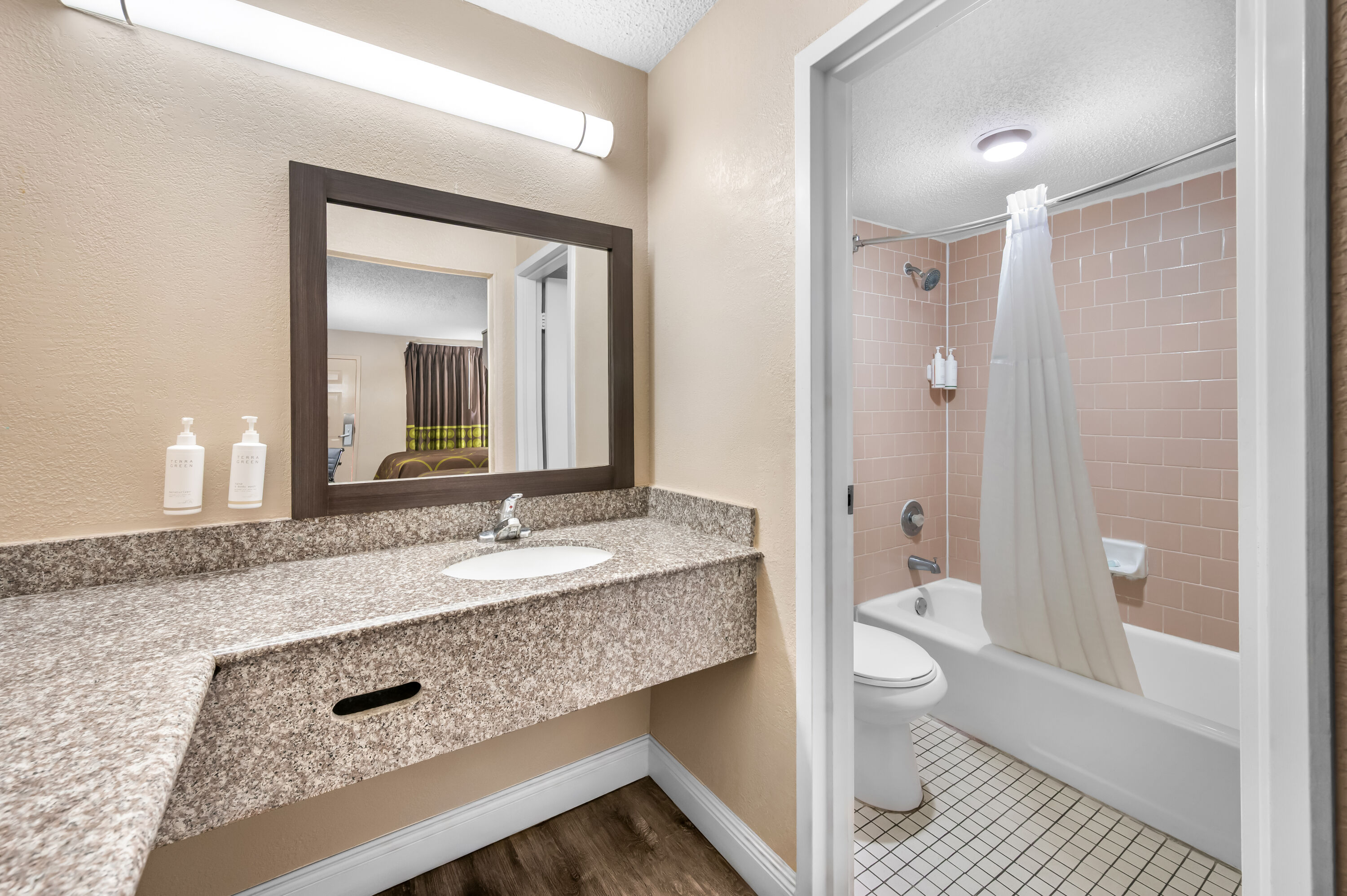 Guest room bath at the Super 8 by Wyndham Metairie in Metairie, Louisiana