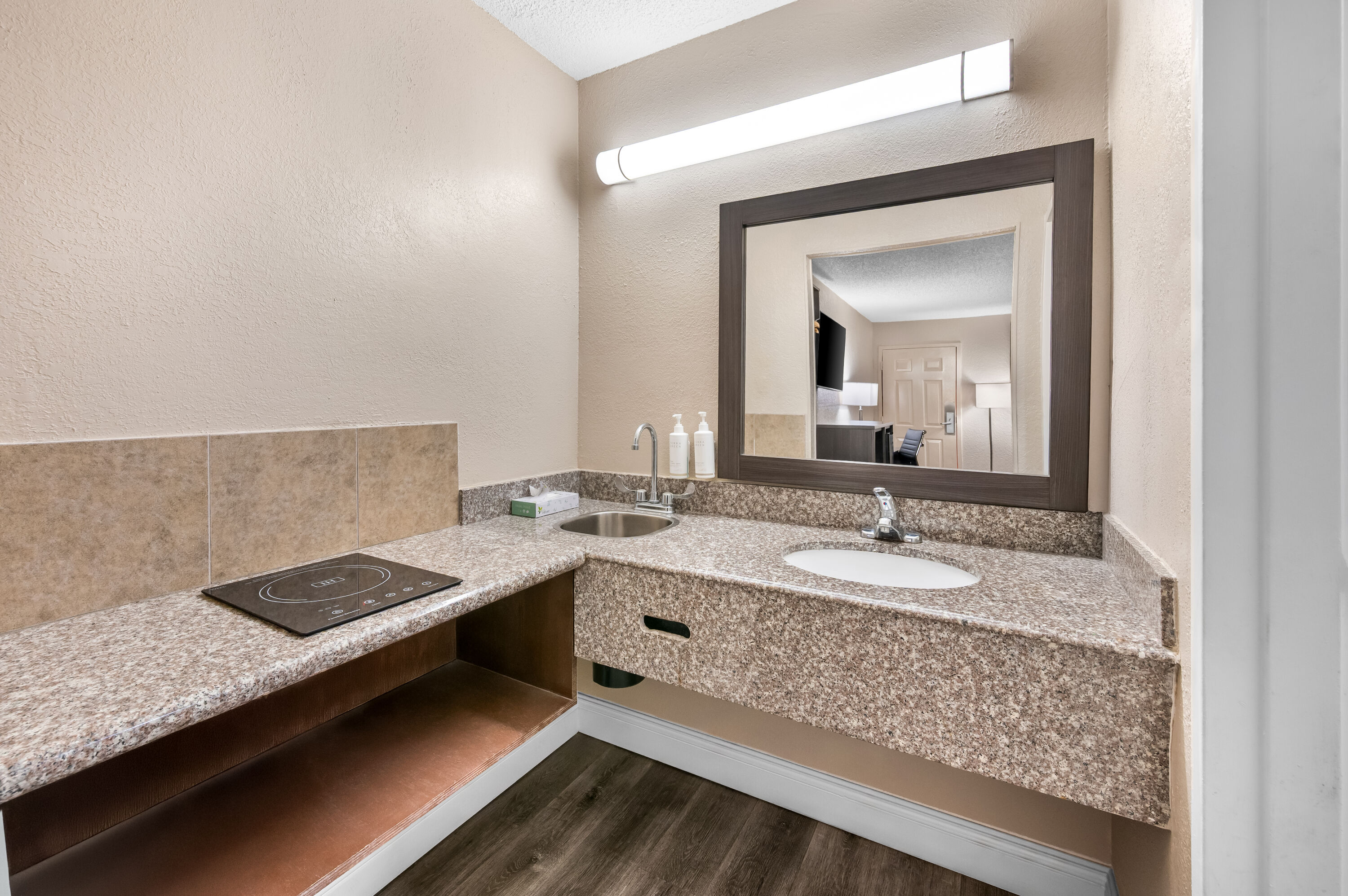 Guest room bath at the Super 8 by Wyndham Metairie in Metairie, Louisiana