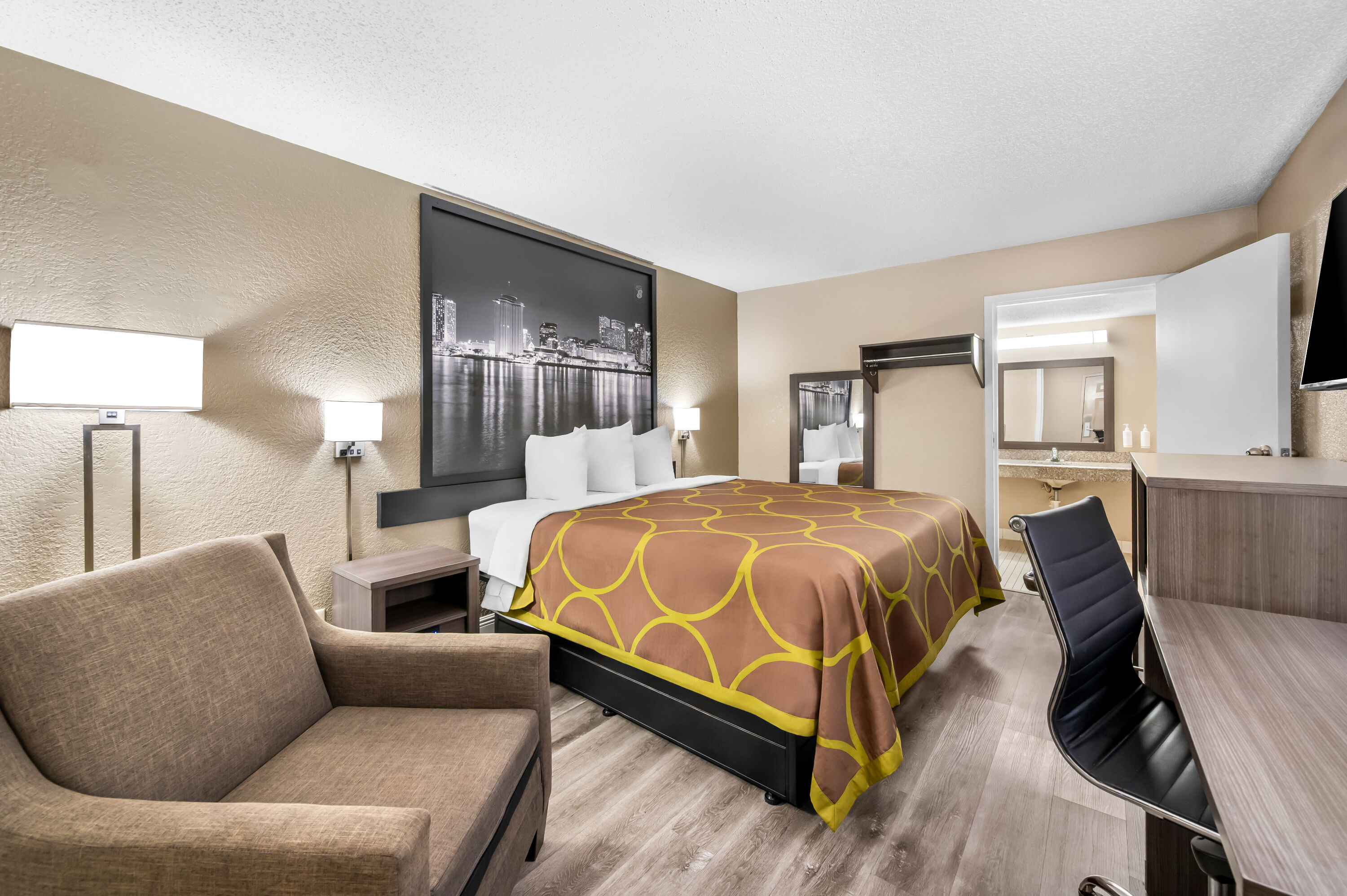 King bed guest room at the Super 8 by Wyndham Metairie in Metairie, Louisiana
