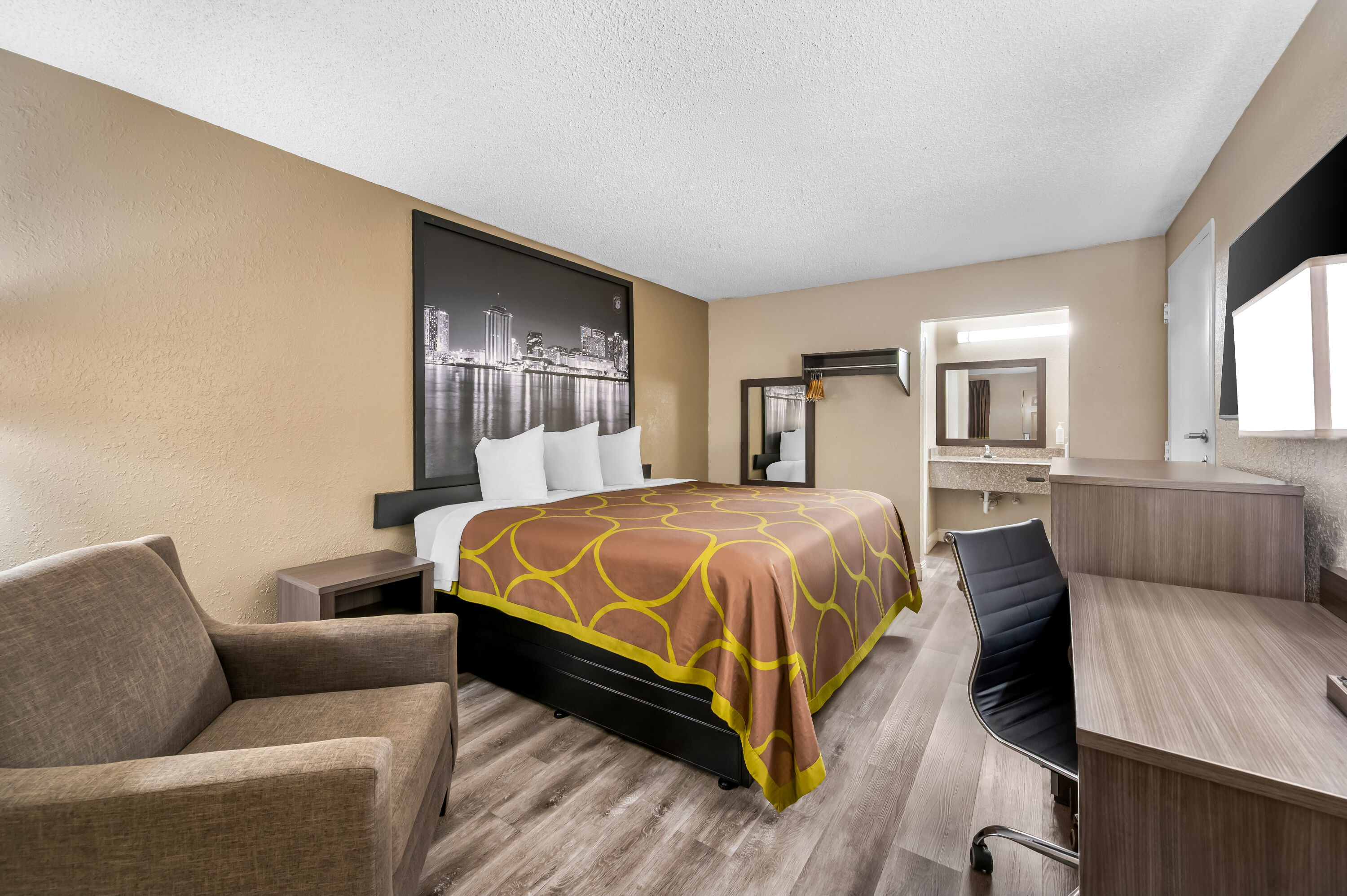 King bed guest room at the Super 8 by Wyndham Metairie in Metairie, Louisiana
