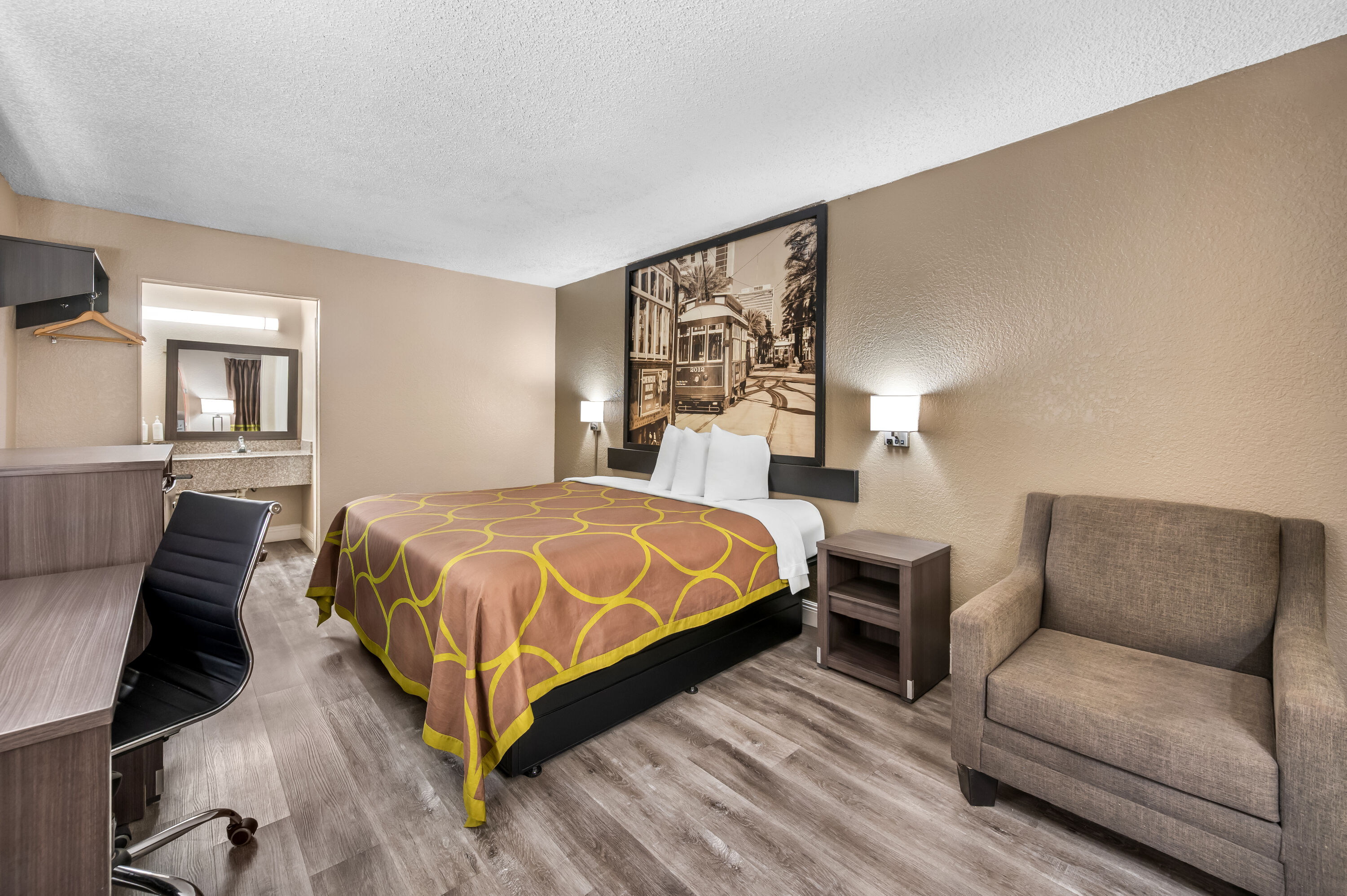 King bed guest room at the Super 8 by Wyndham Metairie in Metairie, Louisiana