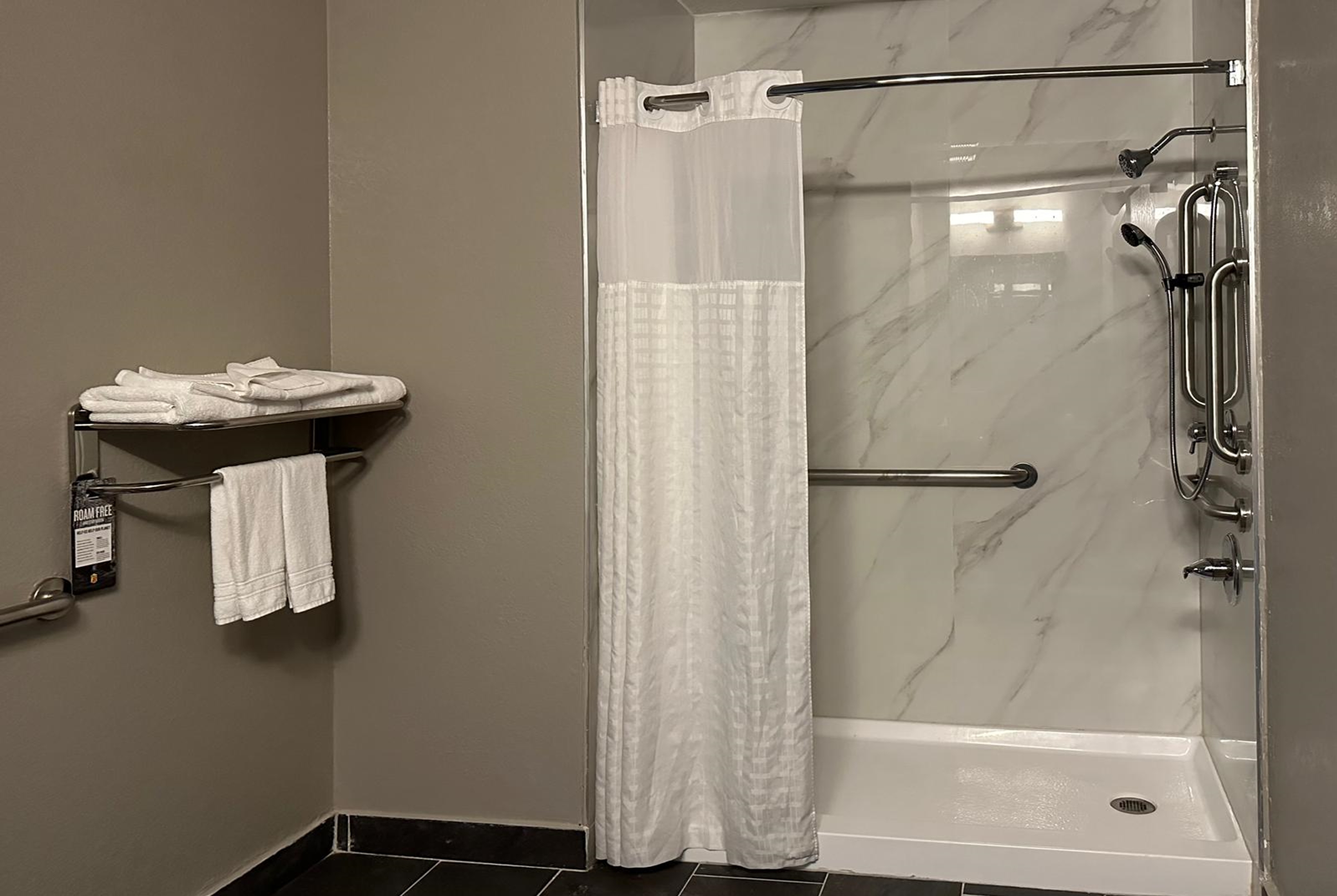 Guest room bath at the Super 8 by Wyndham Monroe in Monroe, Louisiana