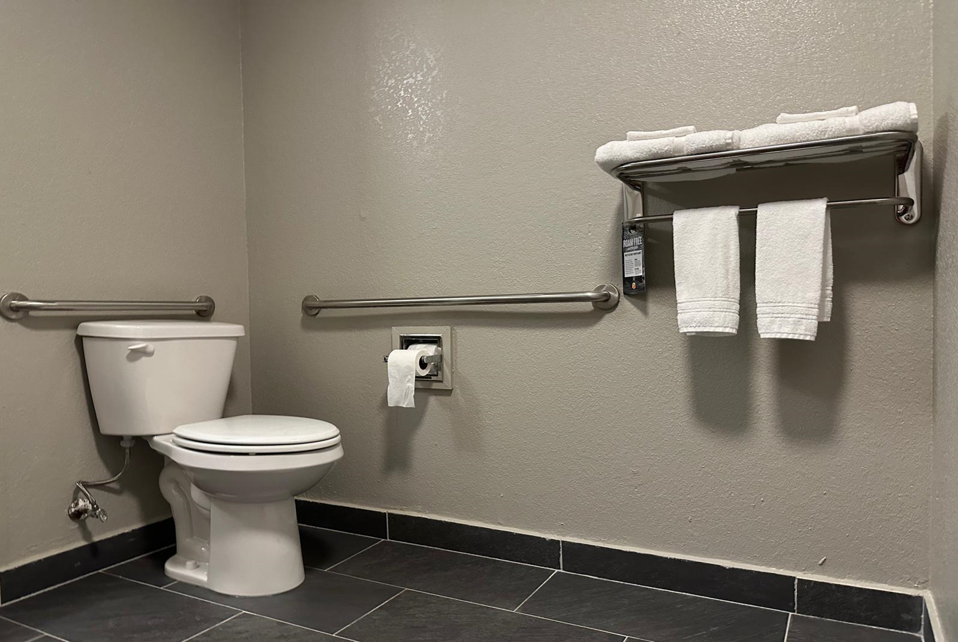 Guest room bath at the Super 8 by Wyndham Monroe in Monroe, Louisiana