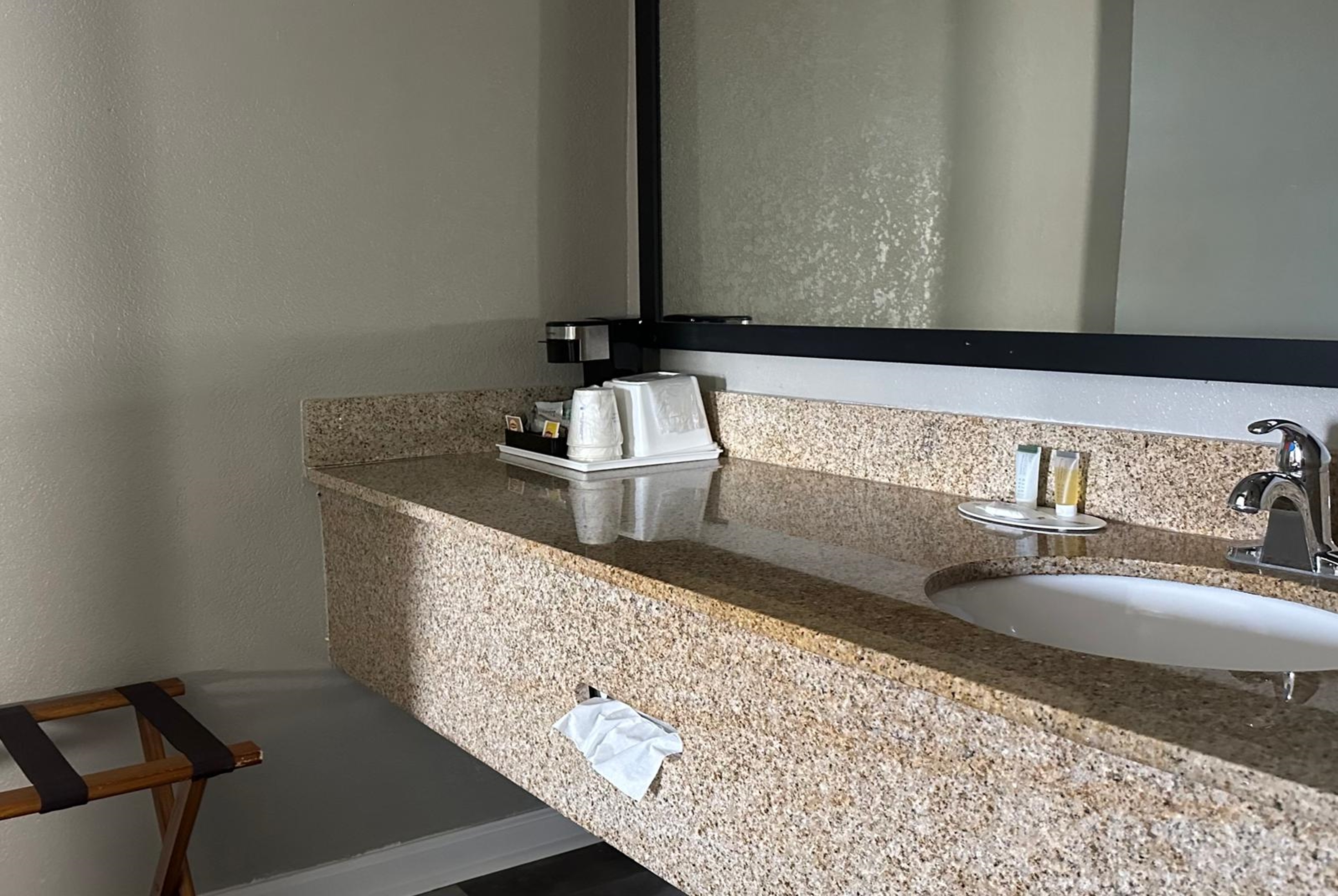 Guest room bath at the Super 8 by Wyndham Monroe in Monroe, Louisiana