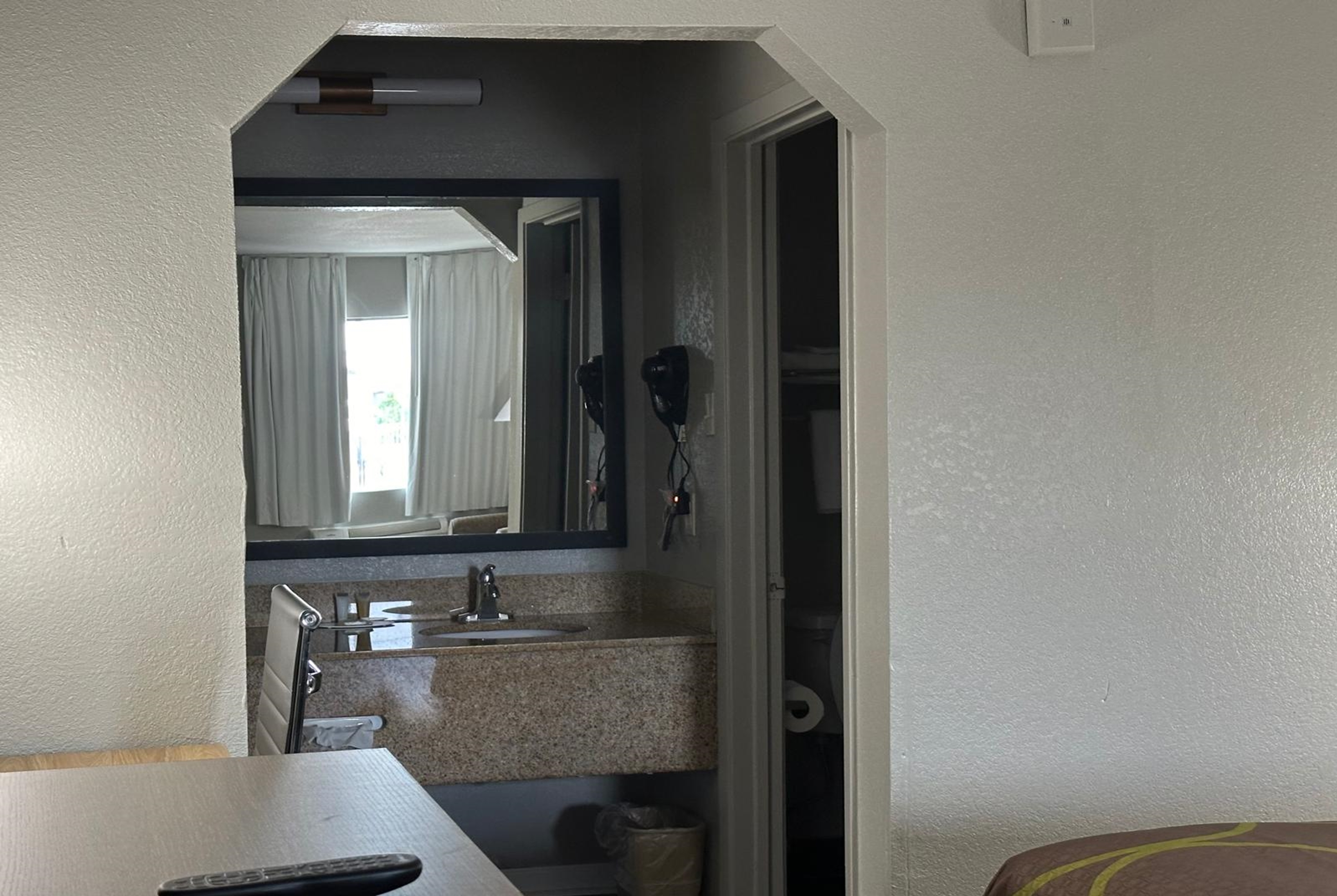 Guest room at the Super 8 by Wyndham Monroe in Monroe, Louisiana