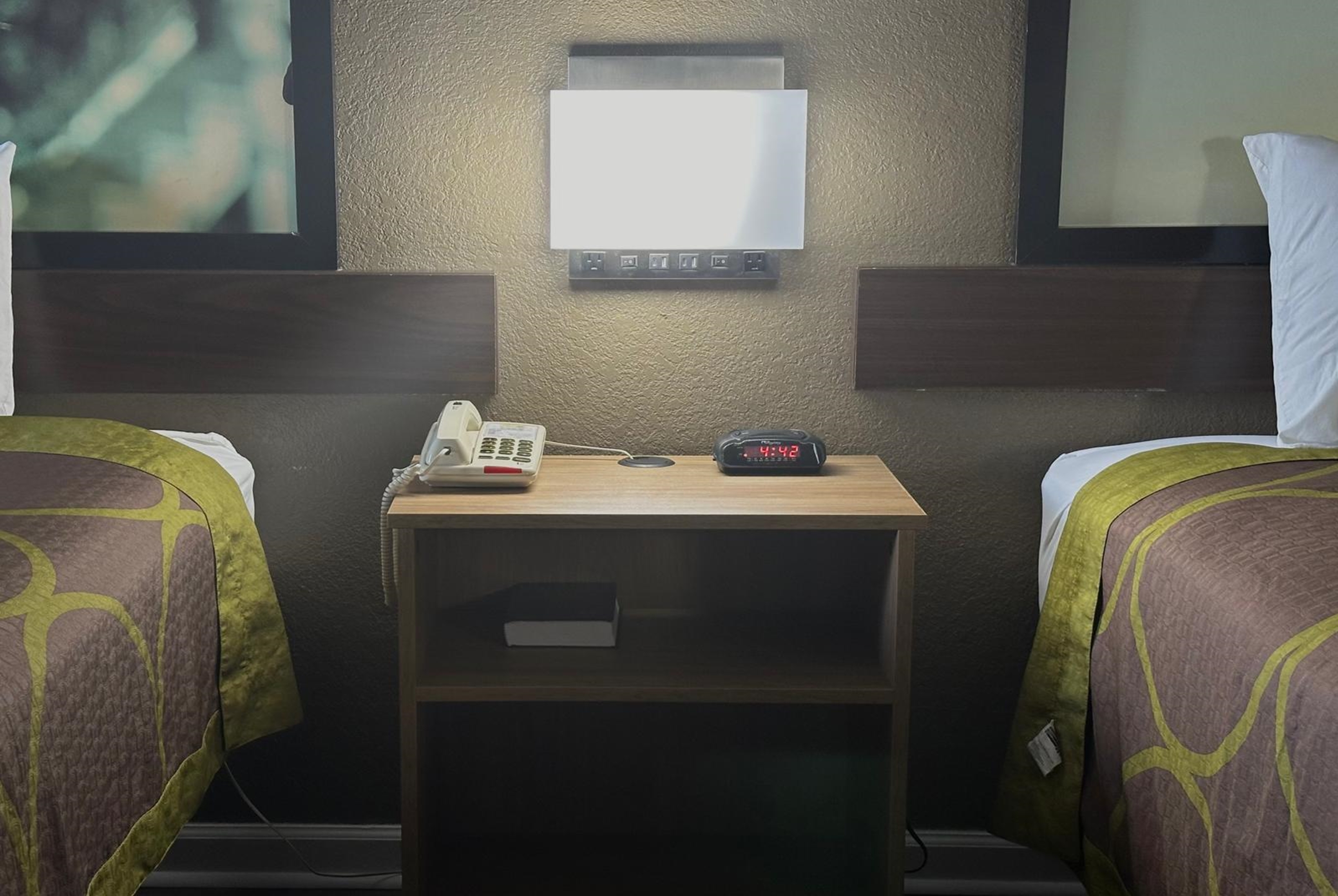 Guest room at the Super 8 by Wyndham Monroe in Monroe, Louisiana