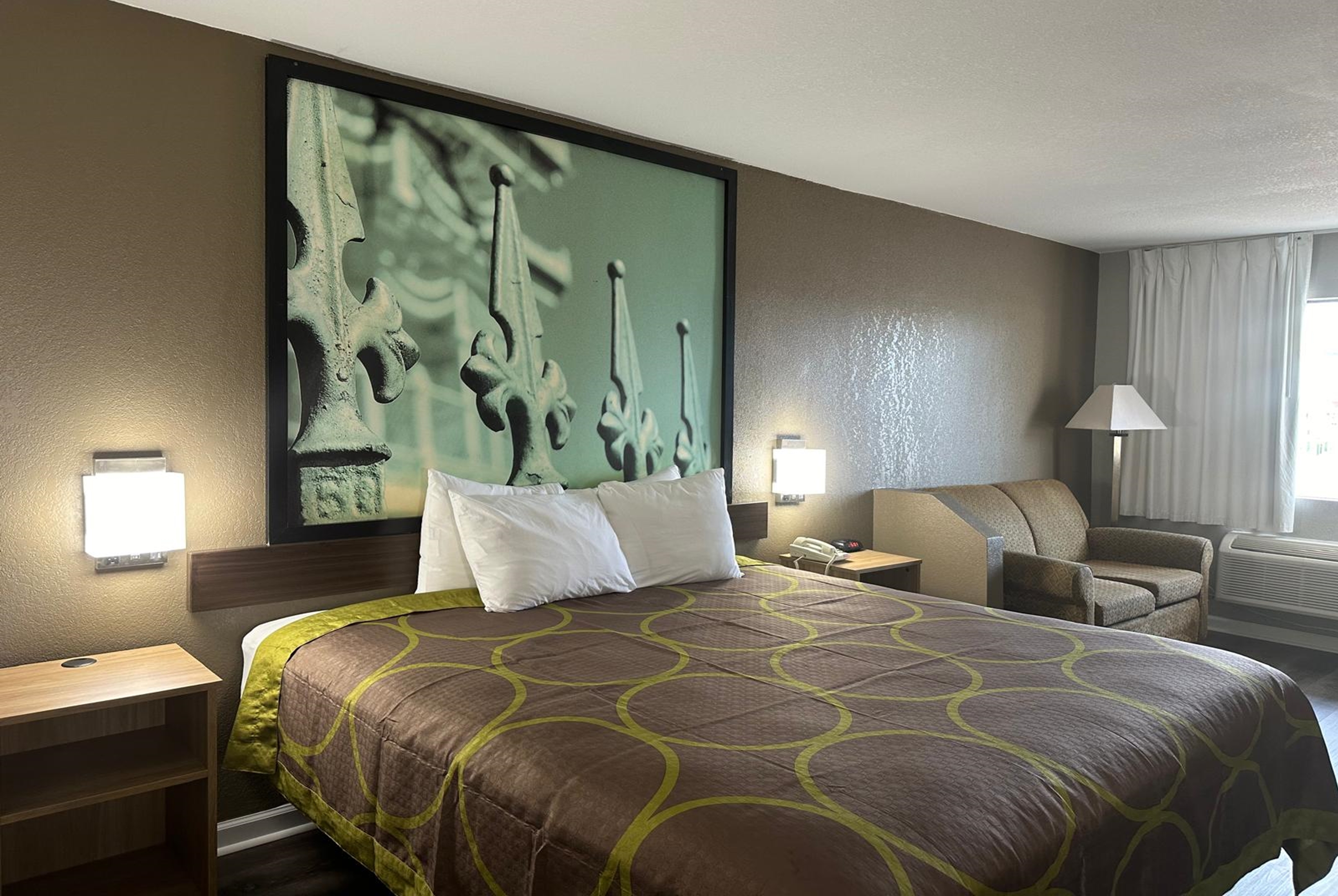 Guest room at the Super 8 by Wyndham Monroe in Monroe, Louisiana