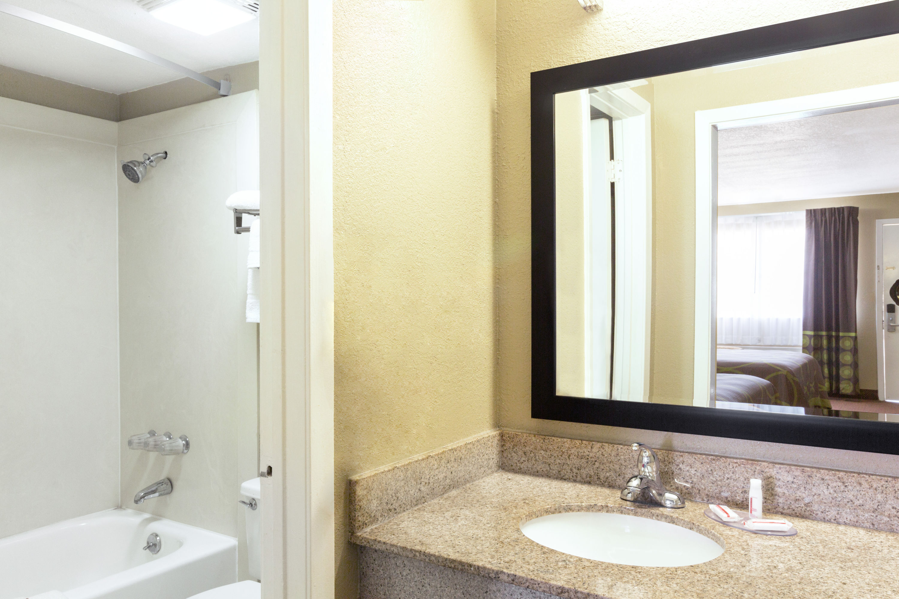 Guest room bath at the Super 8 by Wyndham Tallulah LA in Tallulah, Louisiana