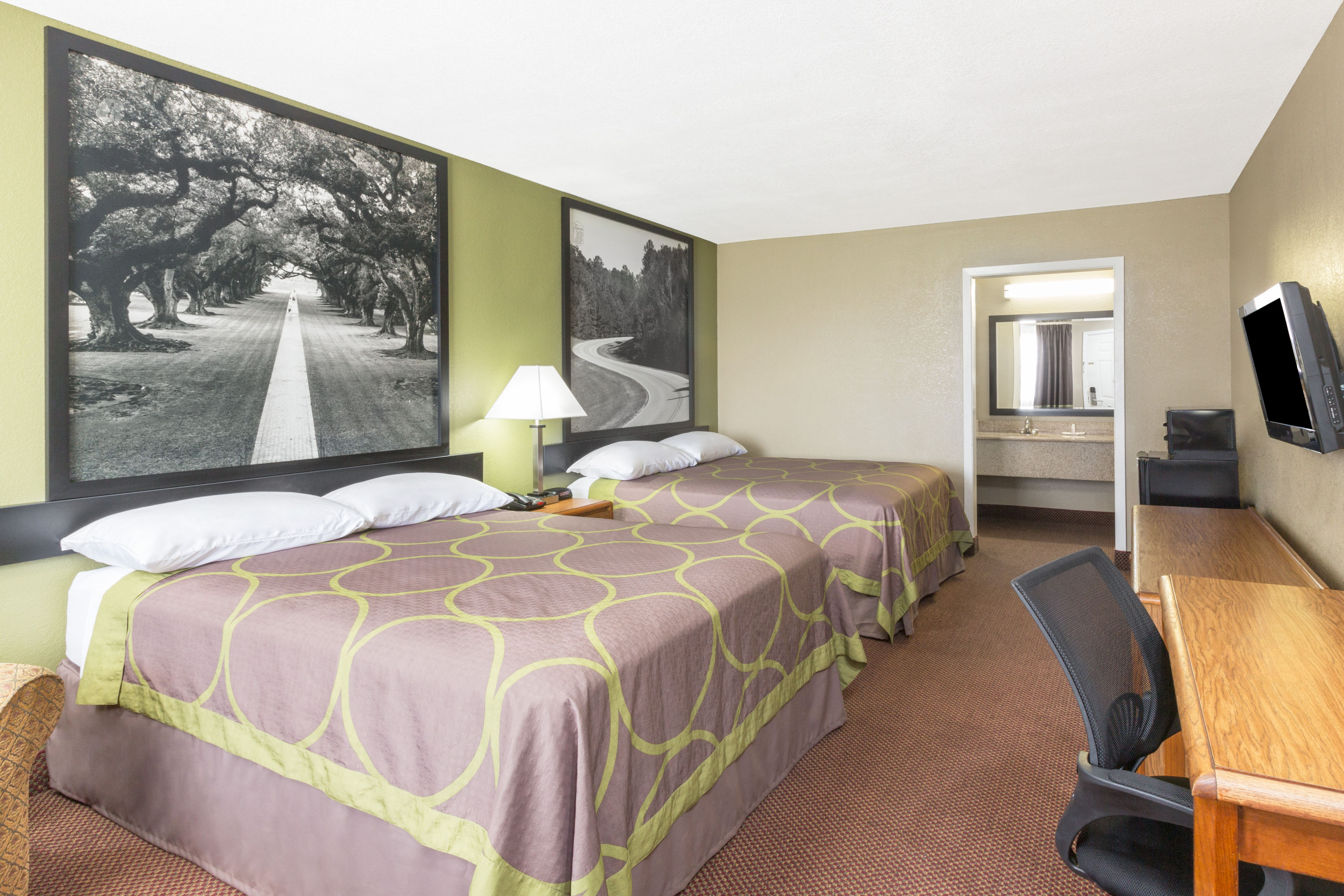 Guest room at the Super 8 by Wyndham Tallulah LA in Tallulah, Louisiana