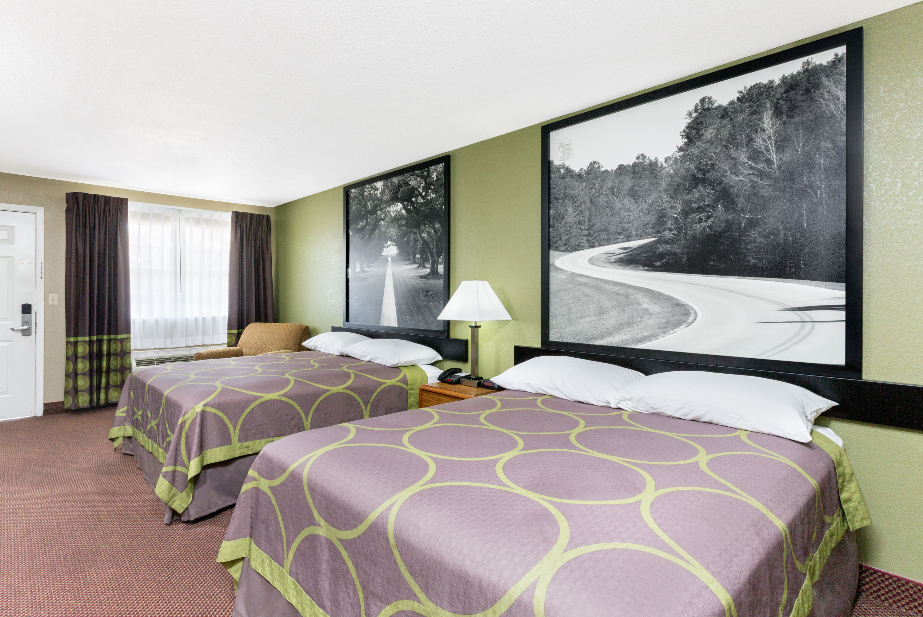 Guest room at the Super 8 by Wyndham Tallulah LA in Tallulah, Louisiana