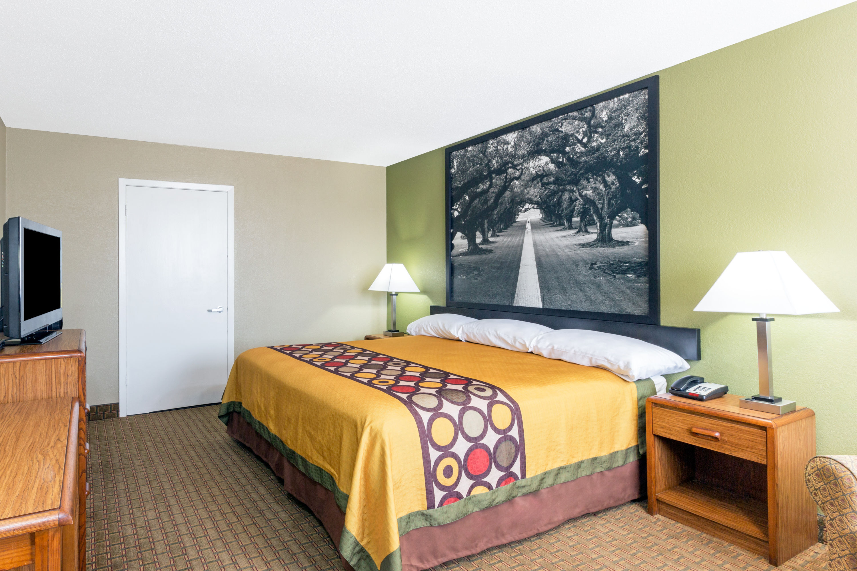 Guest room at the Super 8 by Wyndham Tallulah LA in Tallulah, Louisiana
