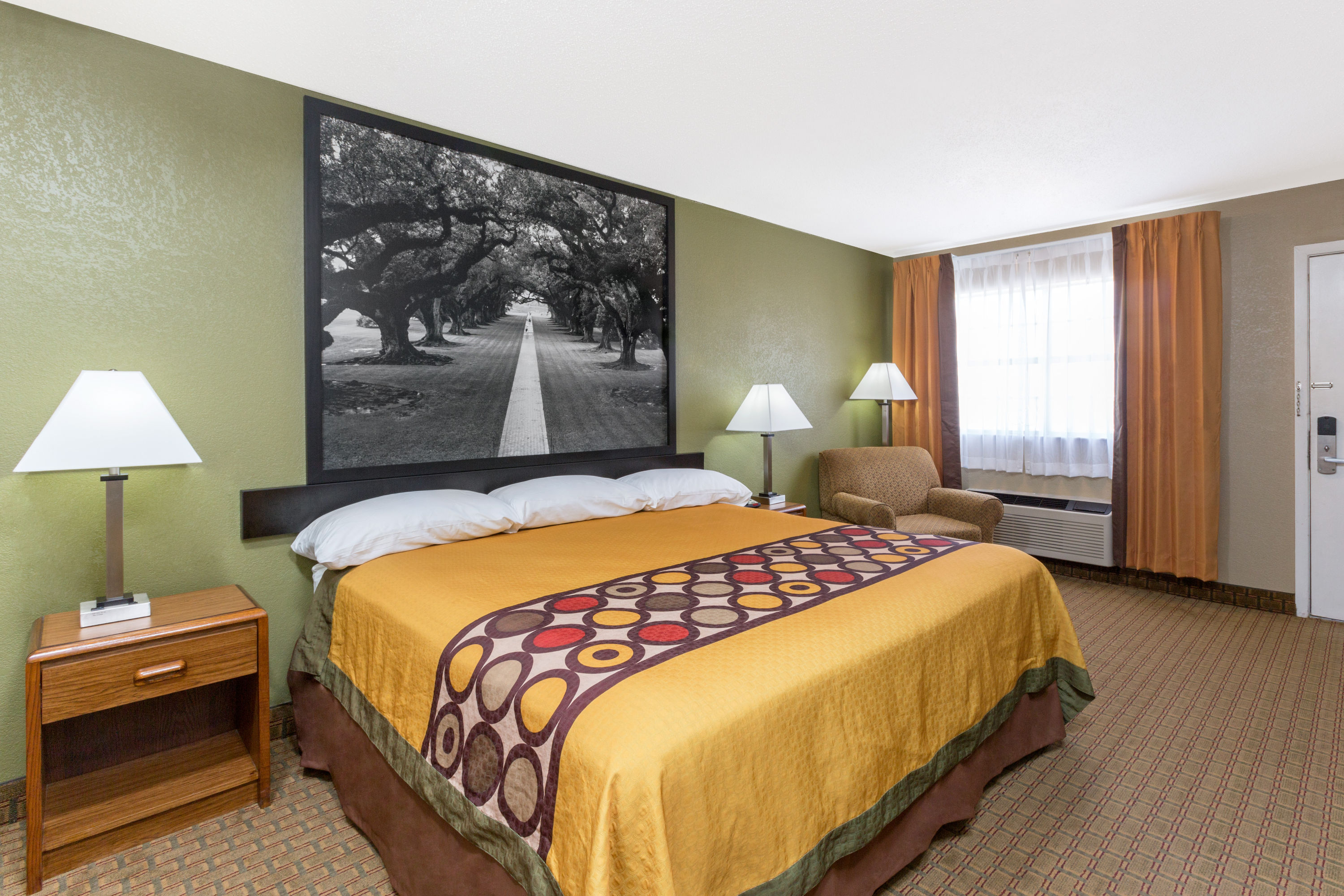 Guest room at the Super 8 by Wyndham Tallulah LA in Tallulah, Louisiana