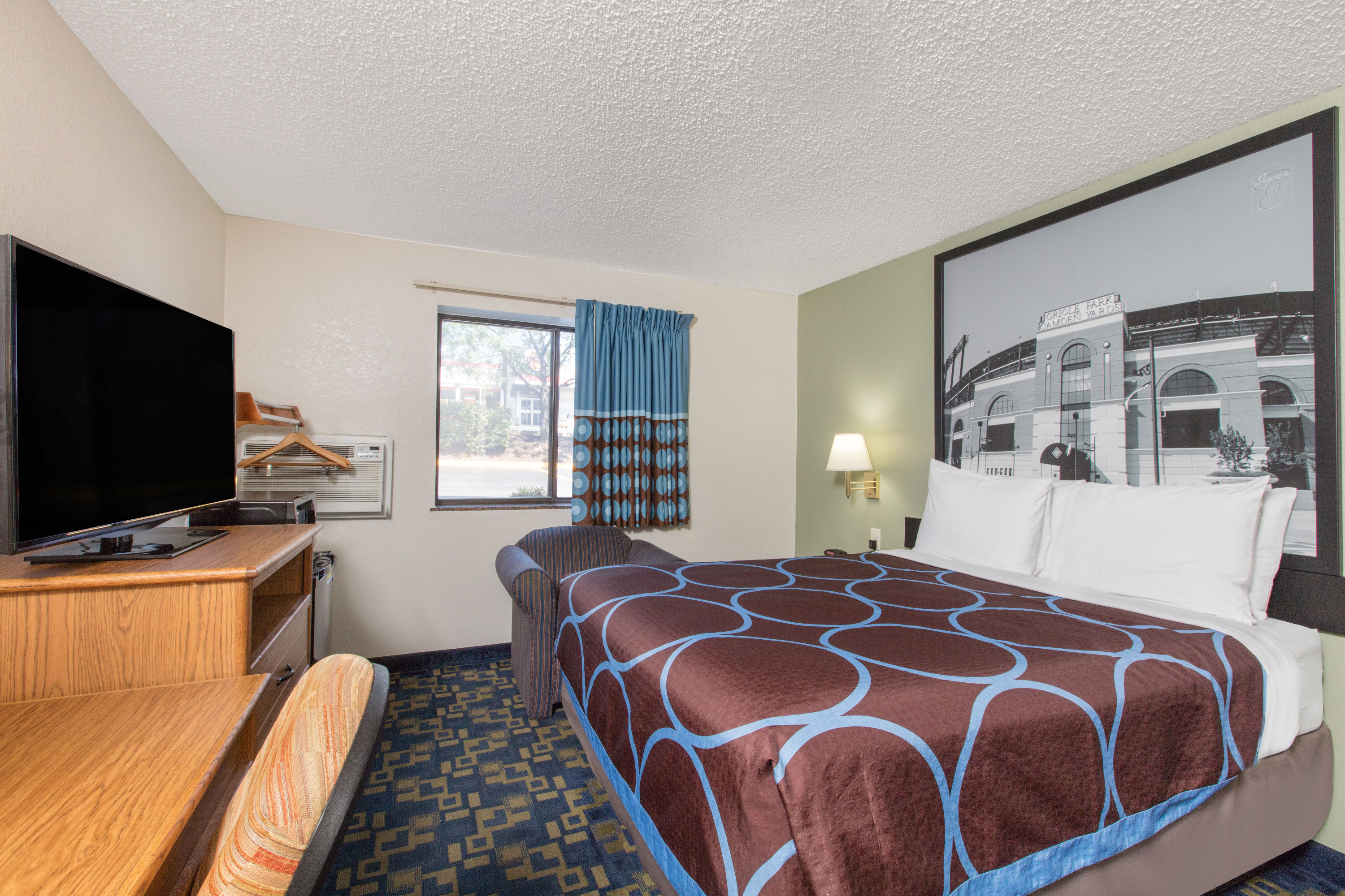Guest room at the Super 8 by Wyndham Aberdeen MD in Aberdeen, Maryland