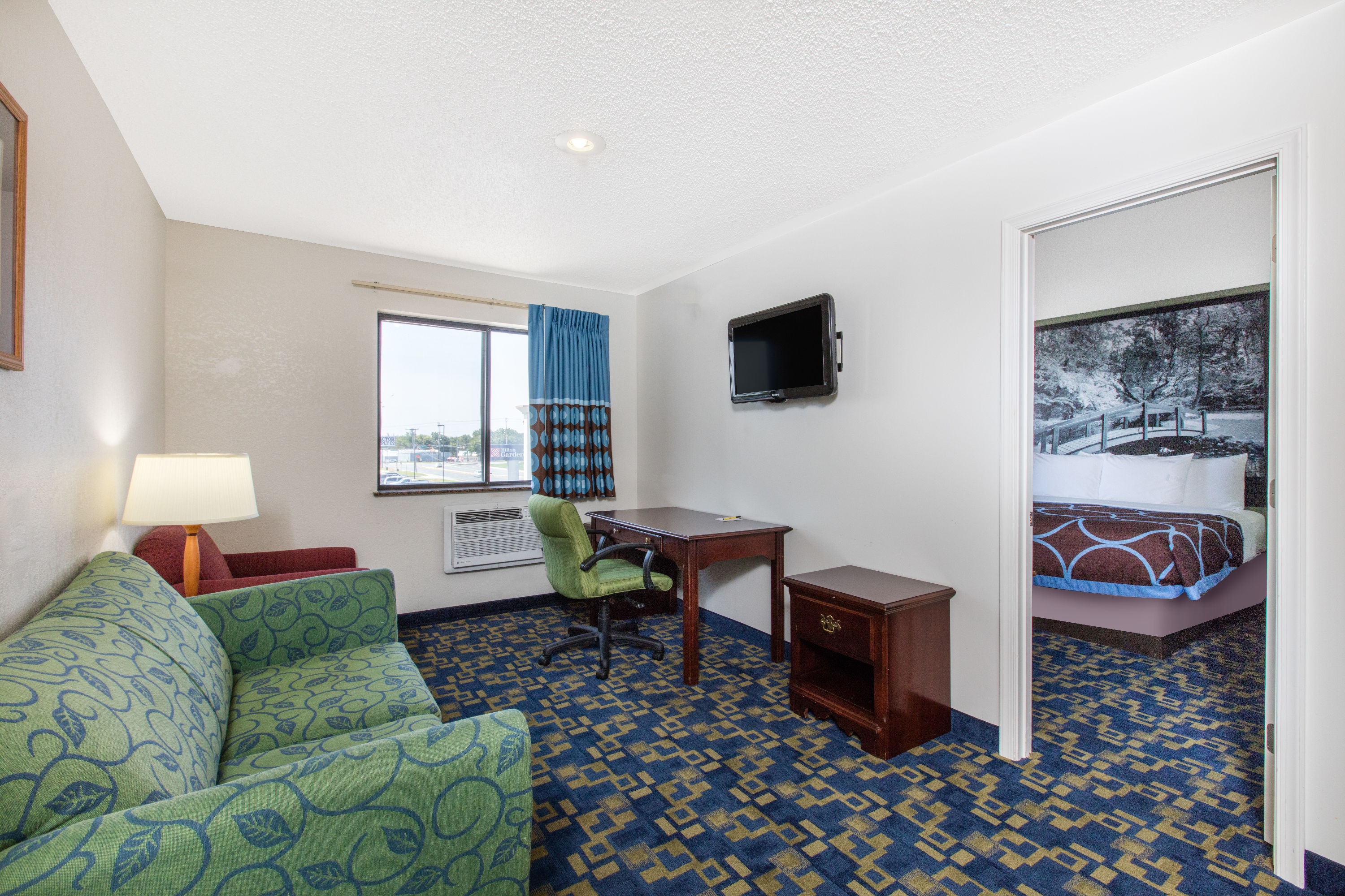 Guest room at the Super 8 by Wyndham Aberdeen MD in Aberdeen, Maryland