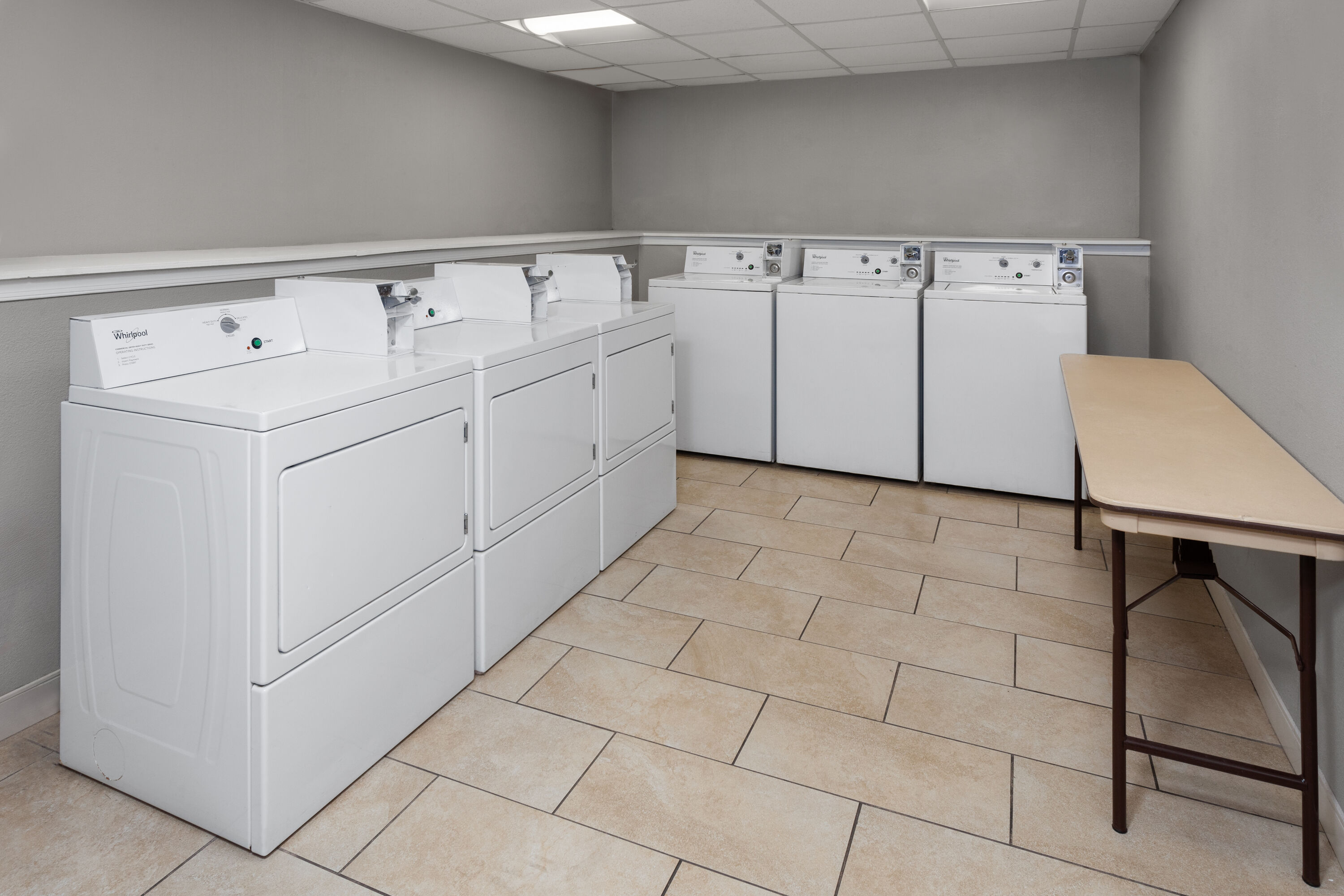 Laundry facilities at Super 8 by Wyndham Baltimore Northwest in Baltimore, Maryland