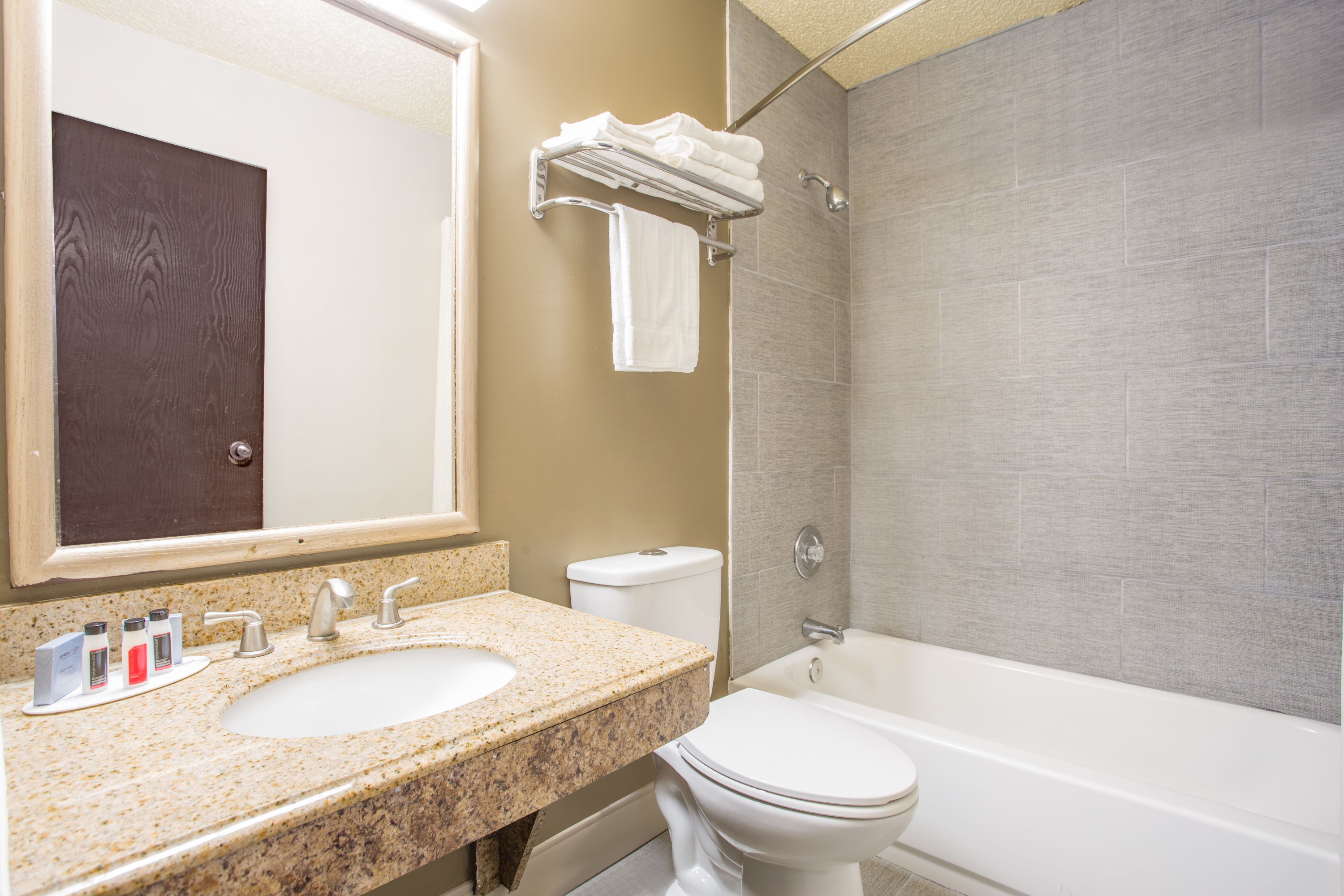Guest room bath at the Super 8 by Wyndham Waldorf in Waldorf, Maryland