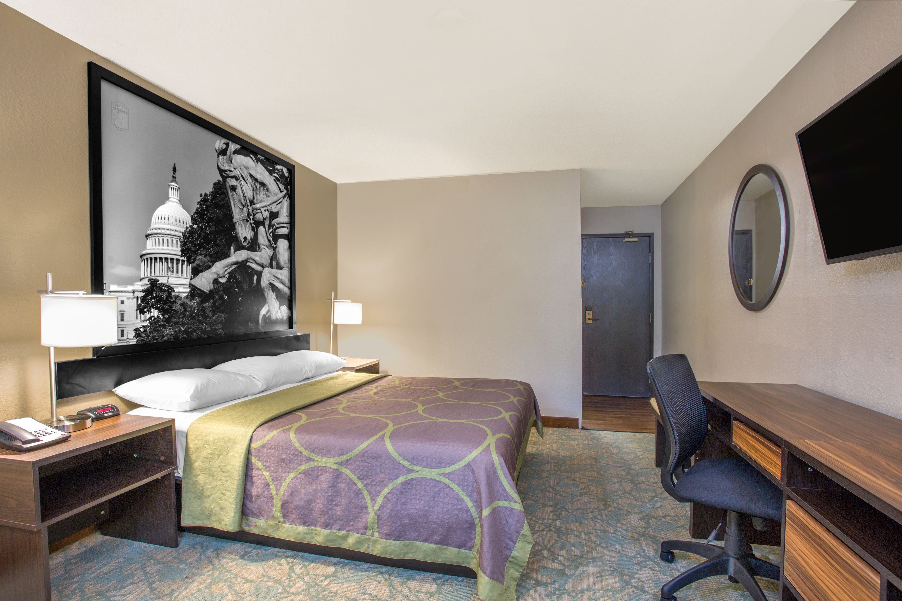 Guest room at the Super 8 by Wyndham Waldorf in Waldorf, Maryland