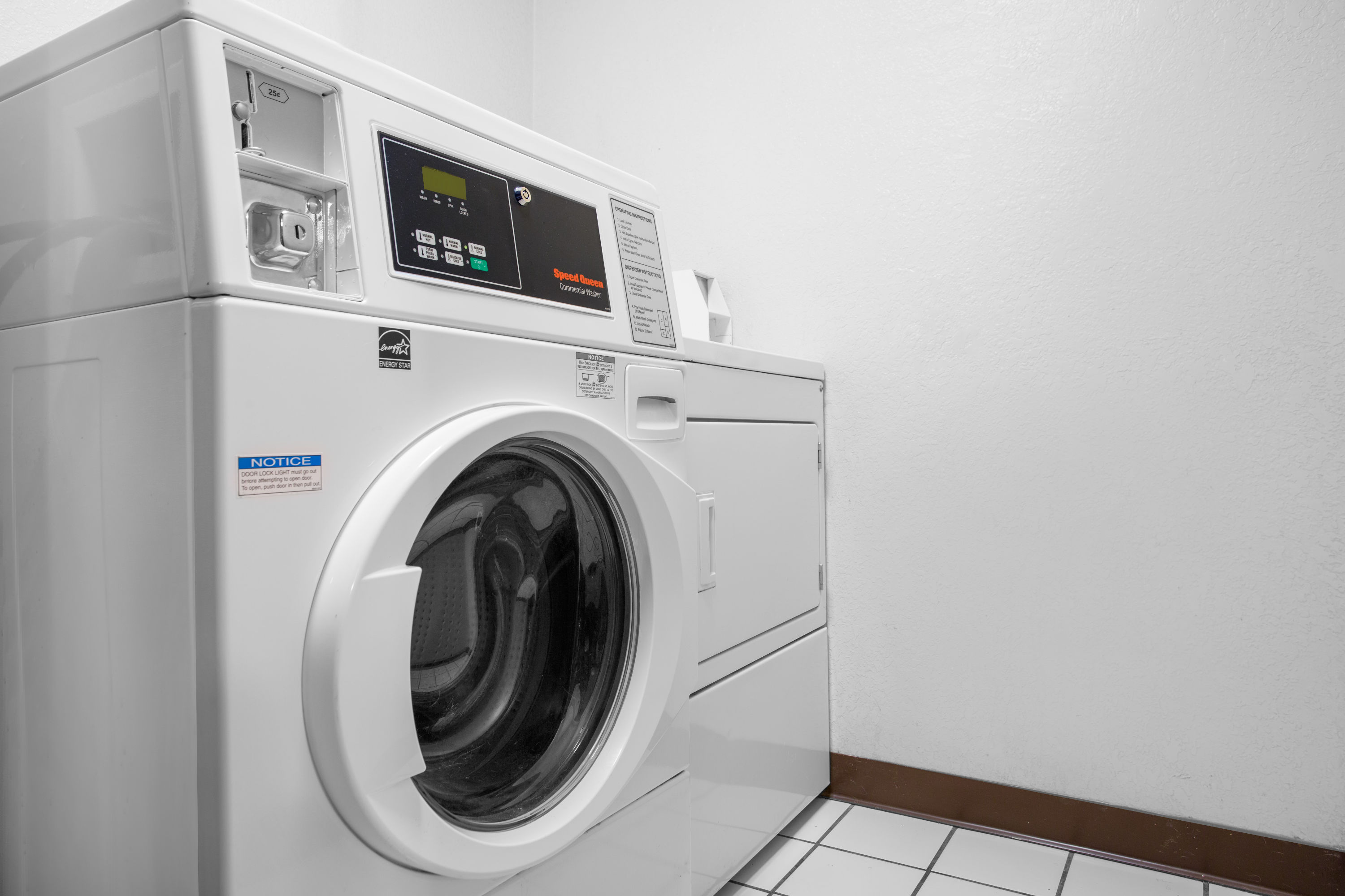 Laundry facilities at Super 8 by Wyndham Waldorf in Waldorf, Maryland