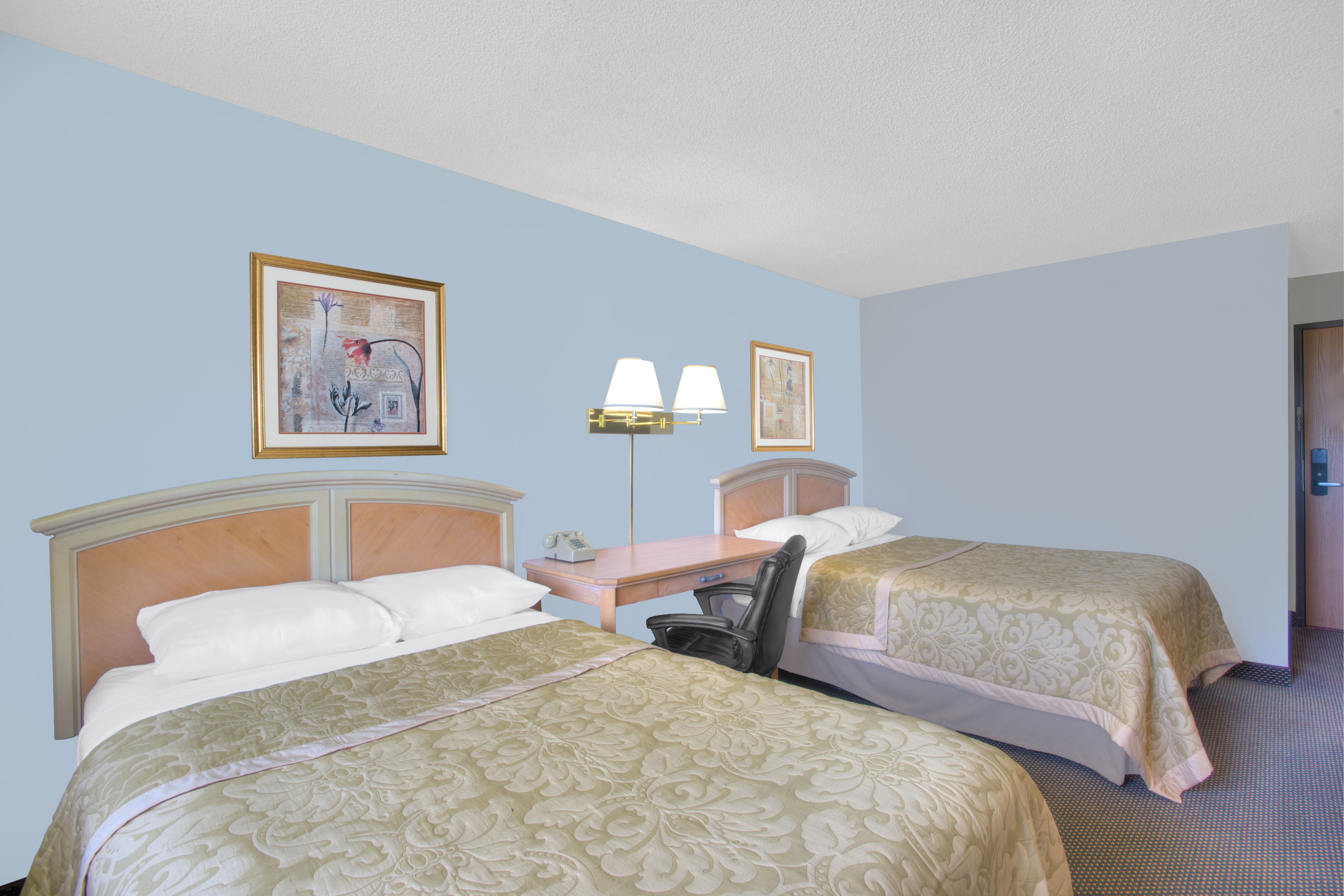 Guest room at the Super 8 by Wyndham Augusta in Augusta, Maine