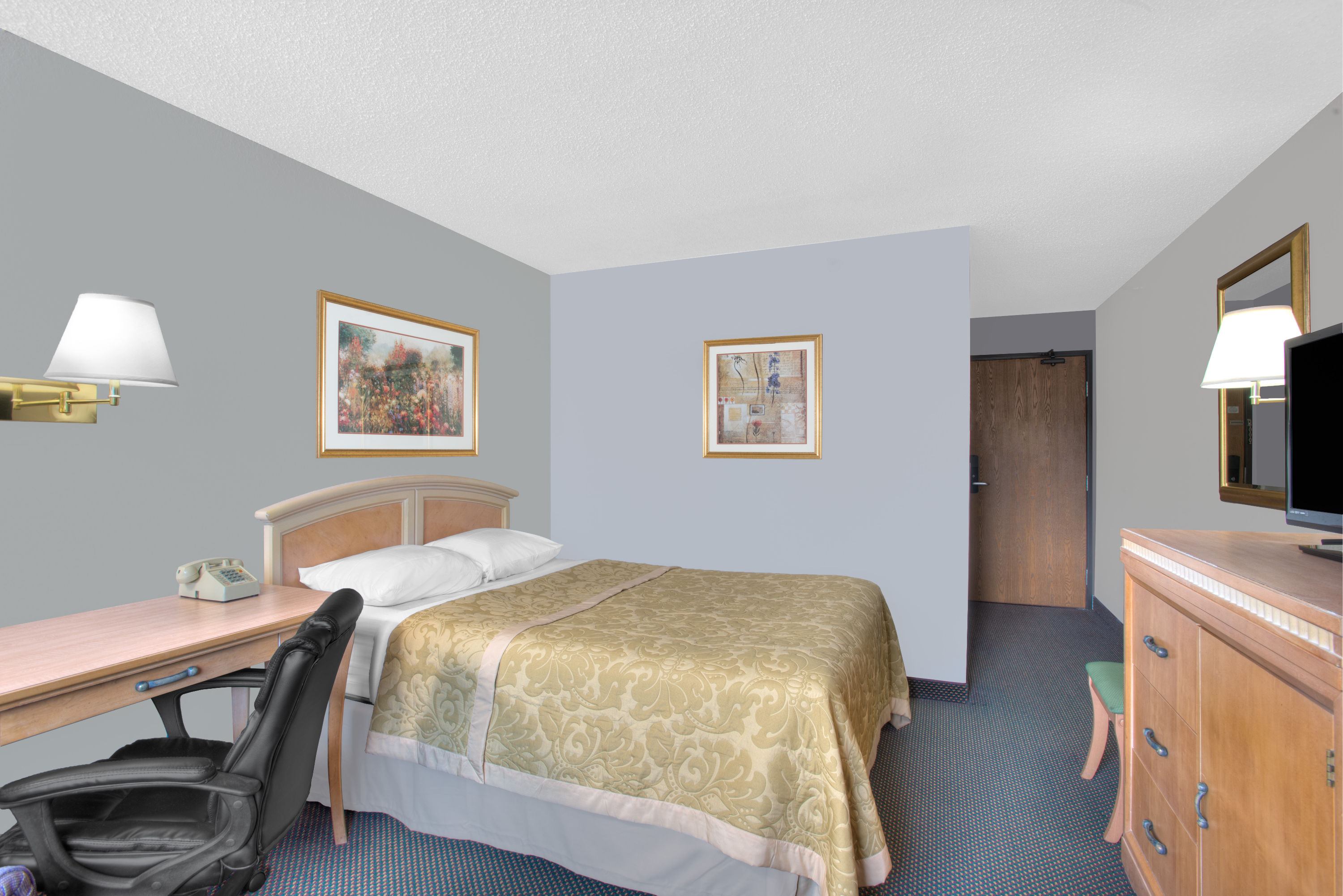 Guest room at the Super 8 by Wyndham Augusta in Augusta, Maine