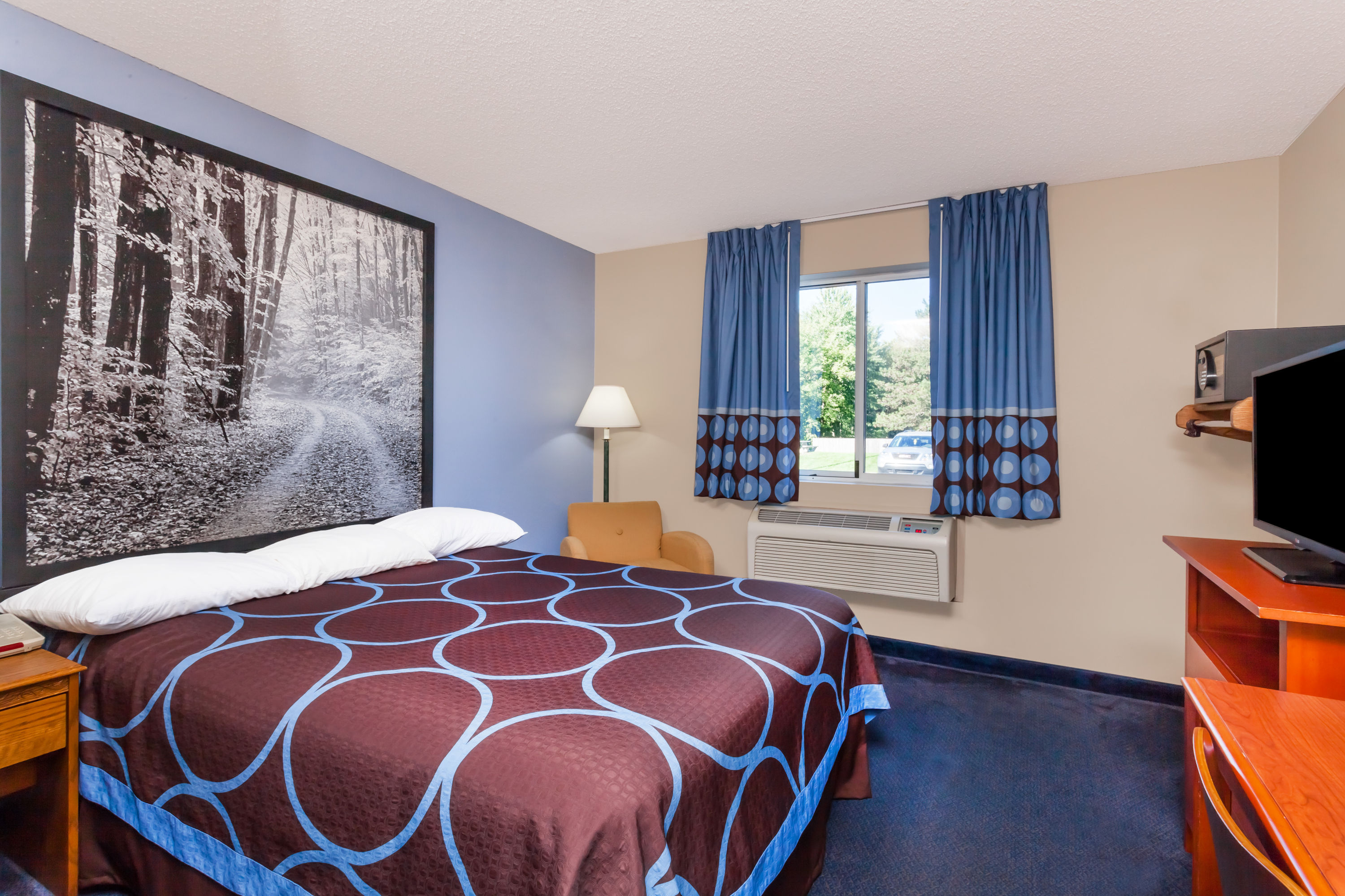 Guest room at the Super 8 by Wyndham Adrian in Adrian, Michigan