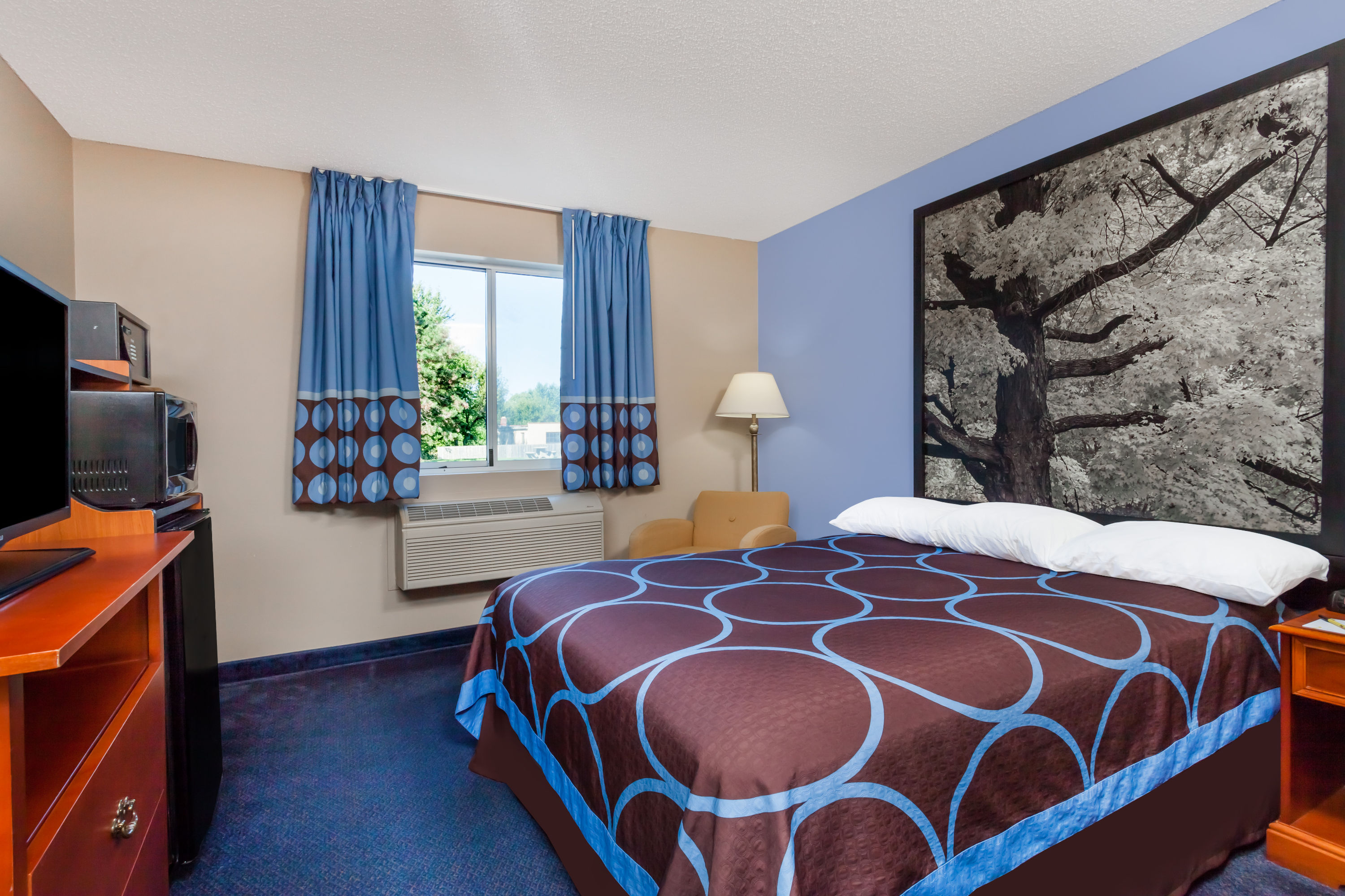 Guest room at the Super 8 by Wyndham Adrian in Adrian, Michigan