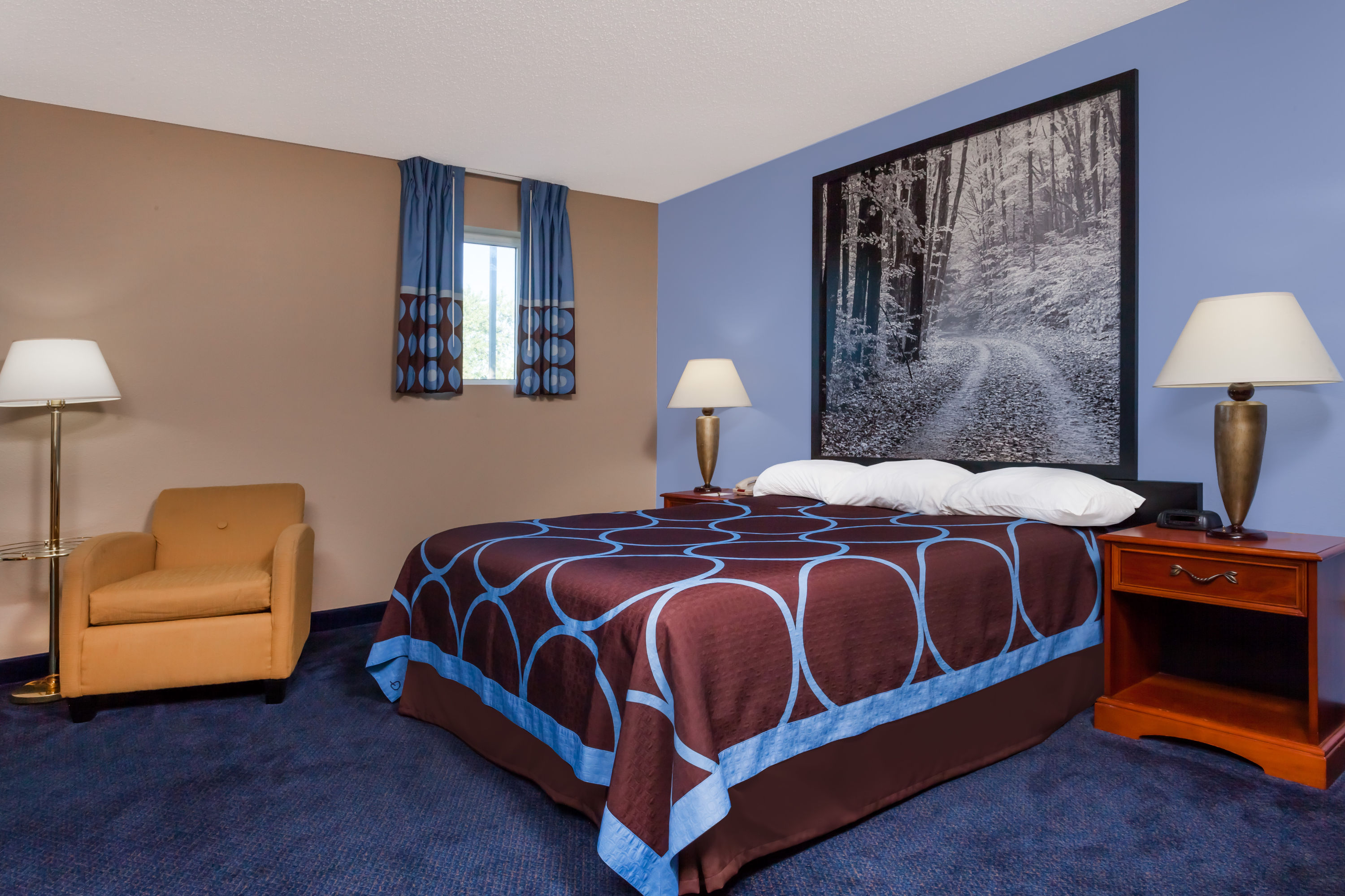 Guest room at the Super 8 by Wyndham Adrian in Adrian, Michigan