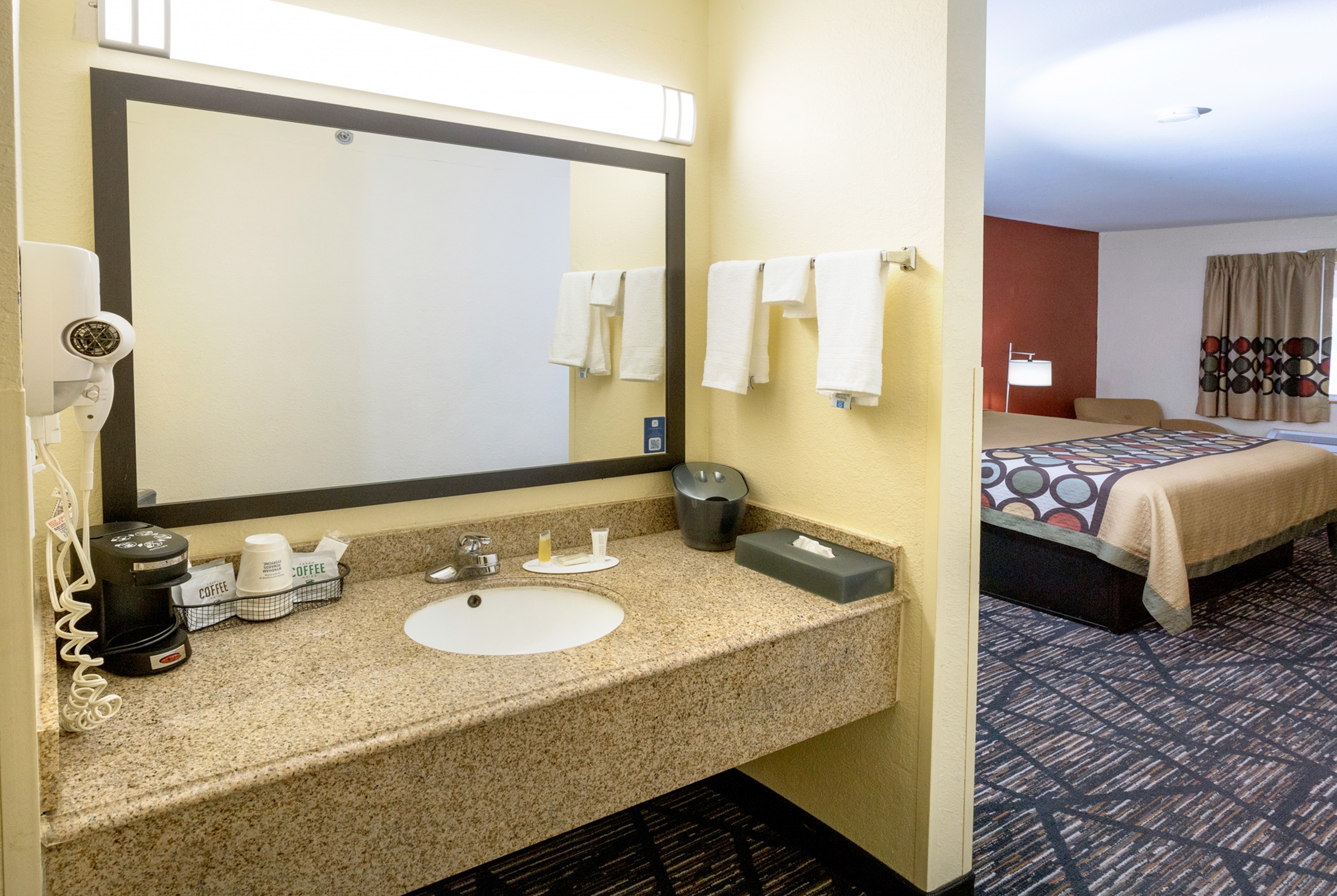 Guest room at the Super 8 by Wyndham Big Rapids in Big Rapids, Michigan