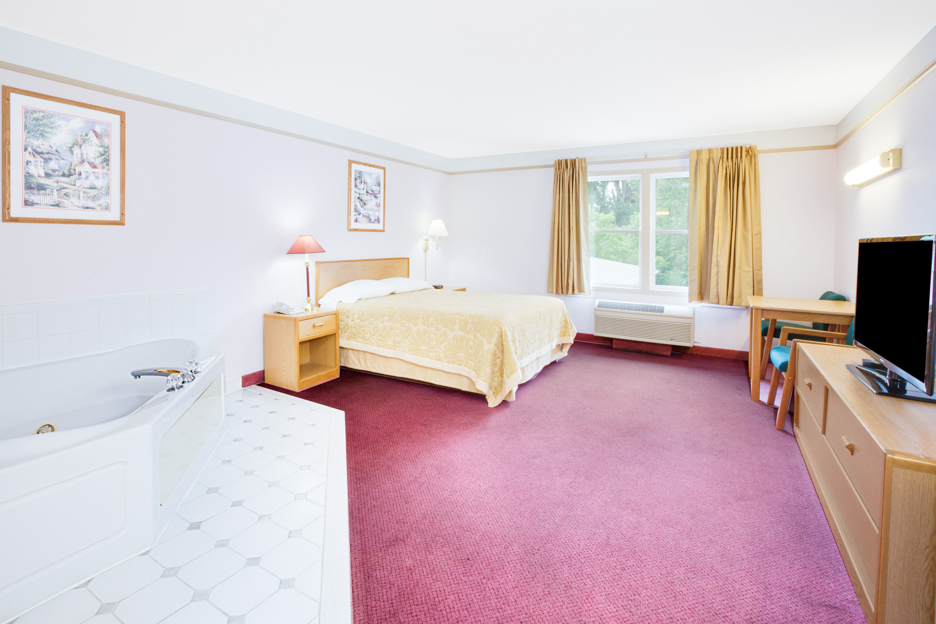 Guest room at the Super 8 by Wyndham Brooklyn in Brooklyn, Michigan