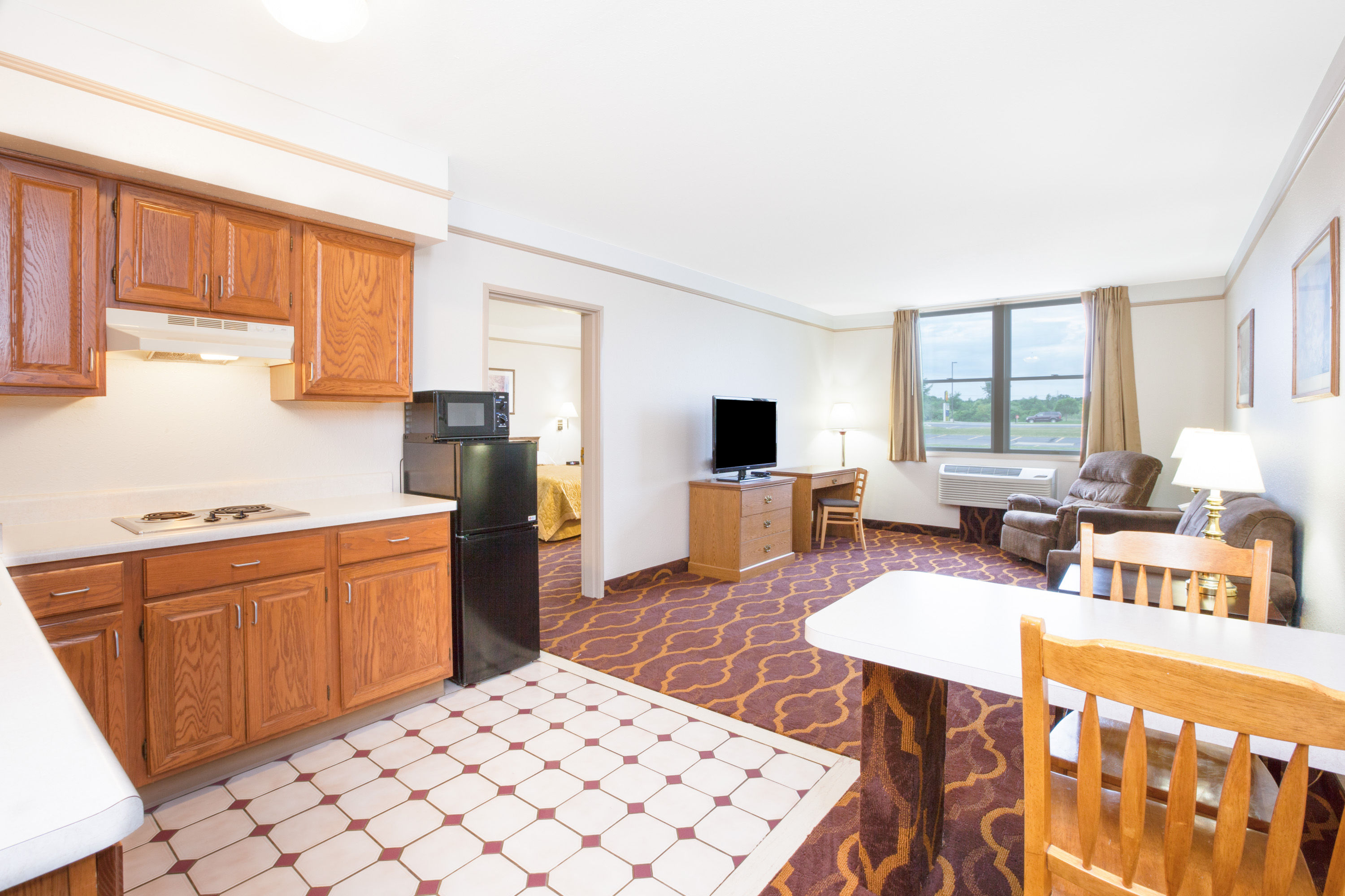 Guest room at the Super 8 by Wyndham Brooklyn in Brooklyn, Michigan