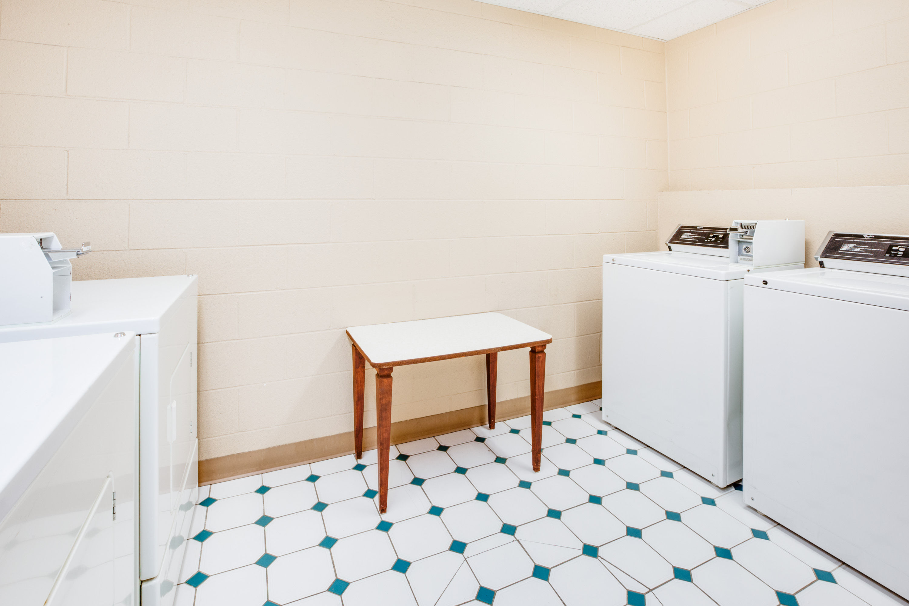 Laundry facilities at Super 8 by Wyndham Brooklyn in Brooklyn, Michigan