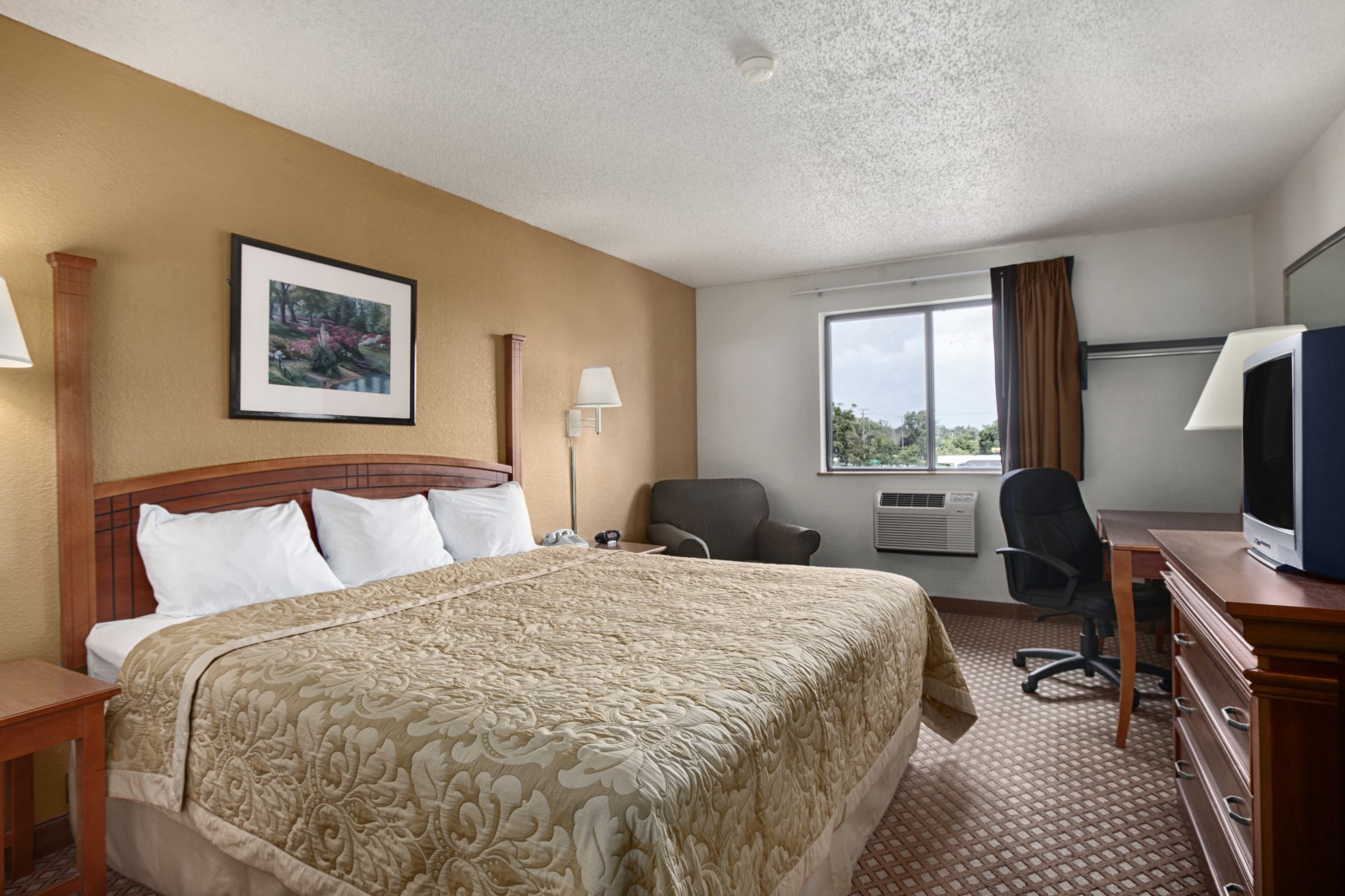 Guest room at the Super 8 by Wyndham Canton/Livonia Area in Canton, Michigan