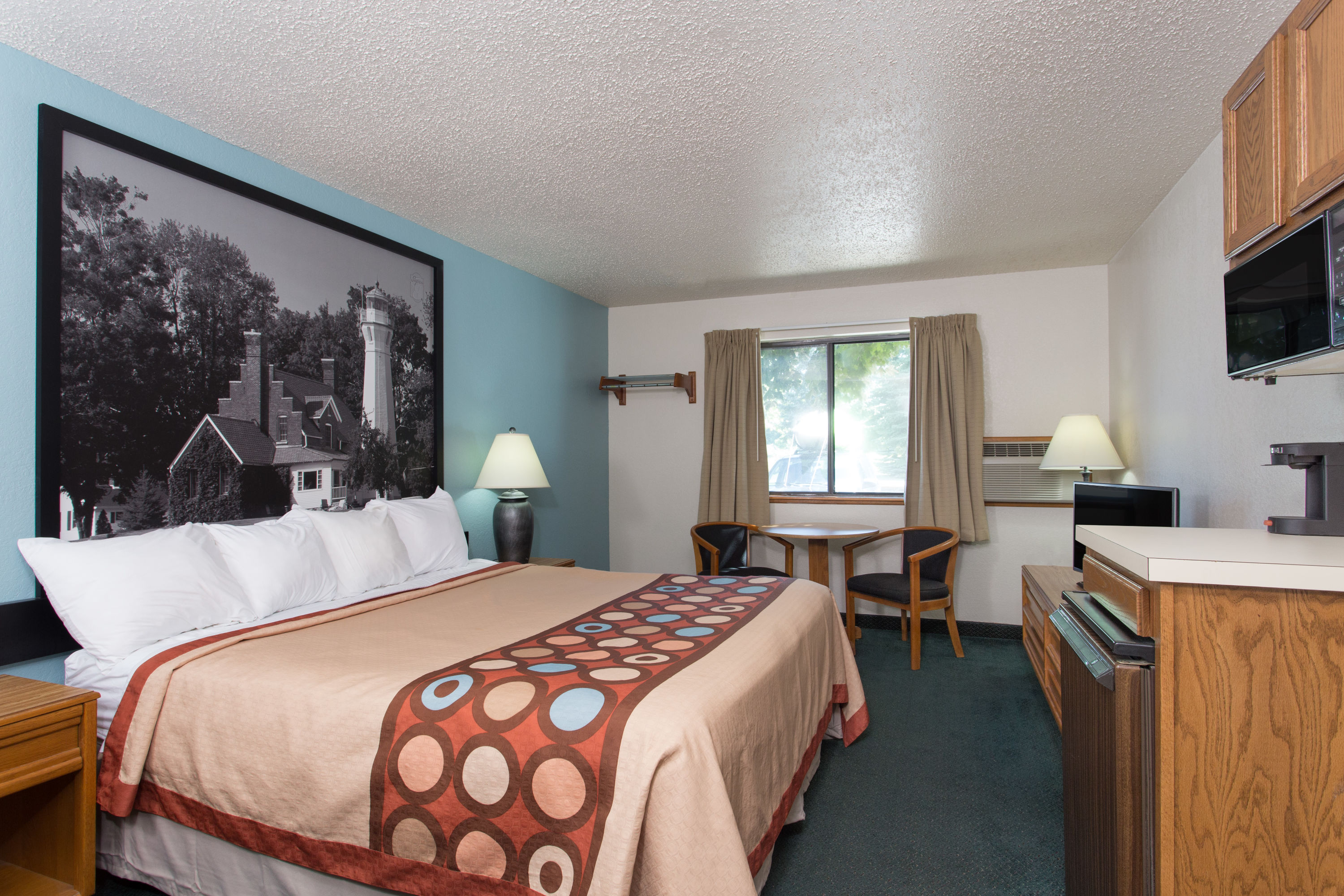 Guest room at the Super 8 by Wyndham Houghton Lake in Houghton Lake, Michigan