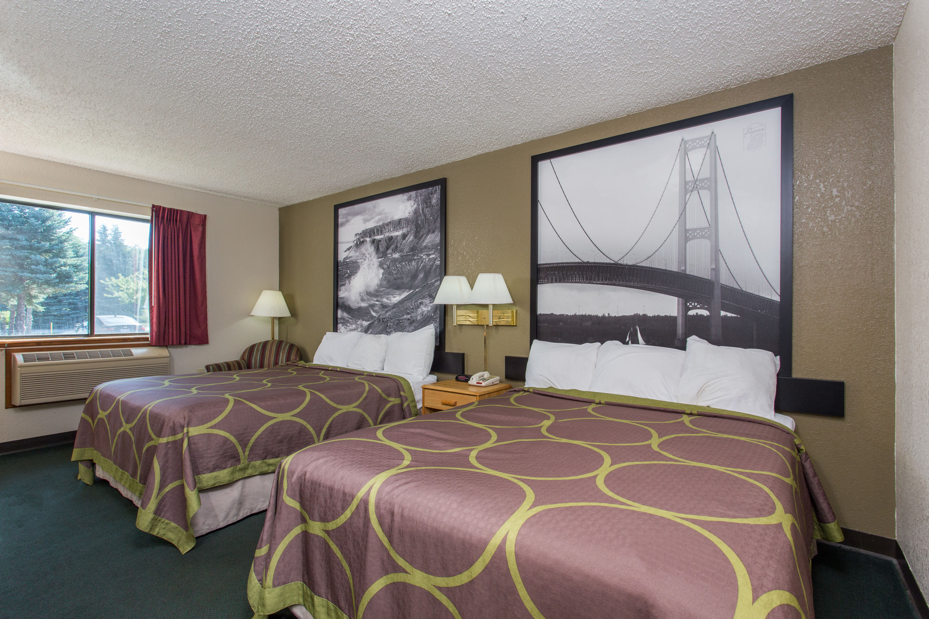 Guest room at the Super 8 by Wyndham Houghton Lake in Houghton Lake, Michigan